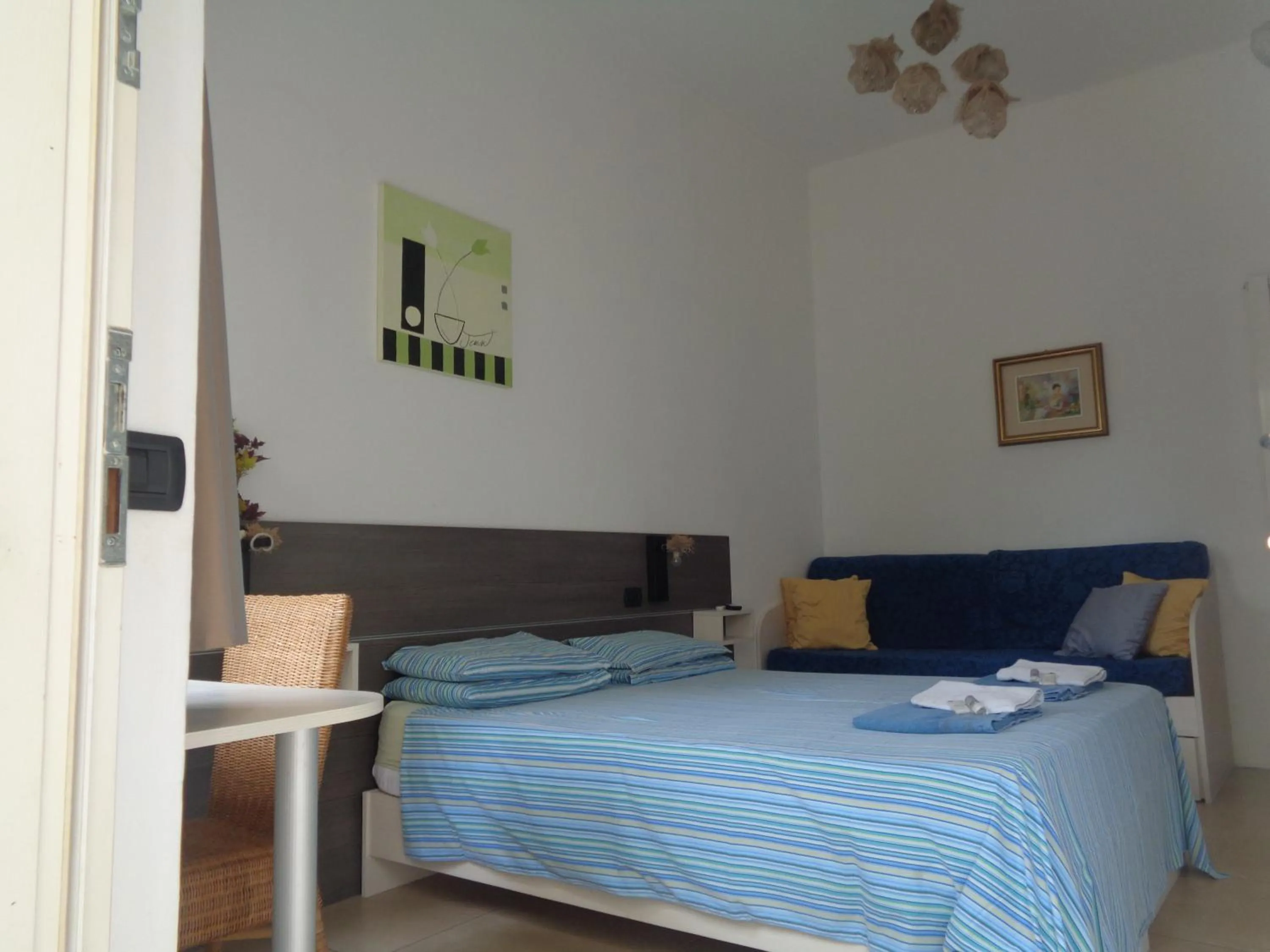 Photo of the whole room, Bed in Prenditempo