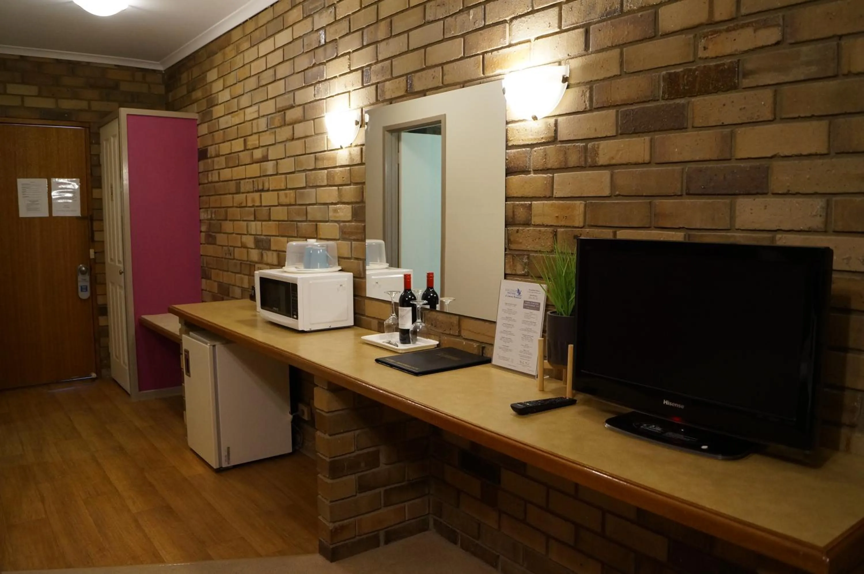 Bedroom in Magdala Motor Lodge & Lakeside Restaurant