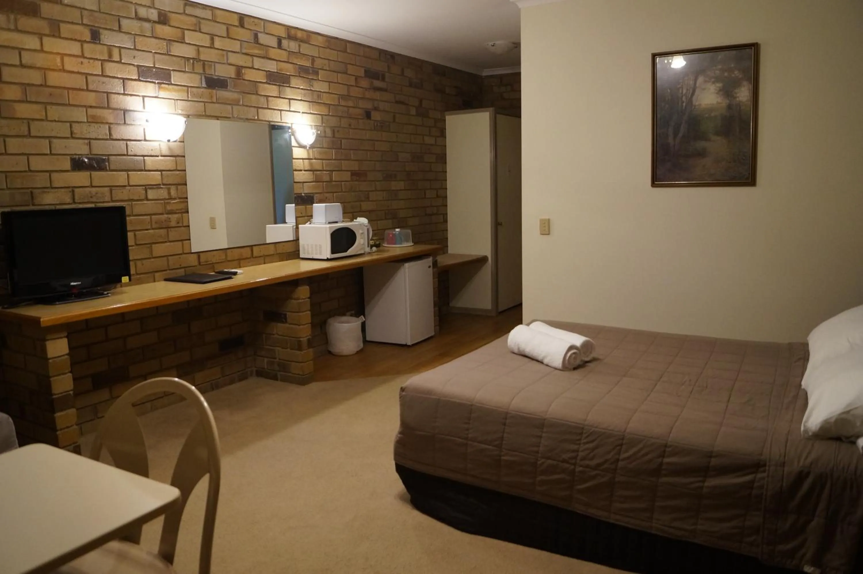 Bed in Magdala Motor Lodge & Lakeside Restaurant