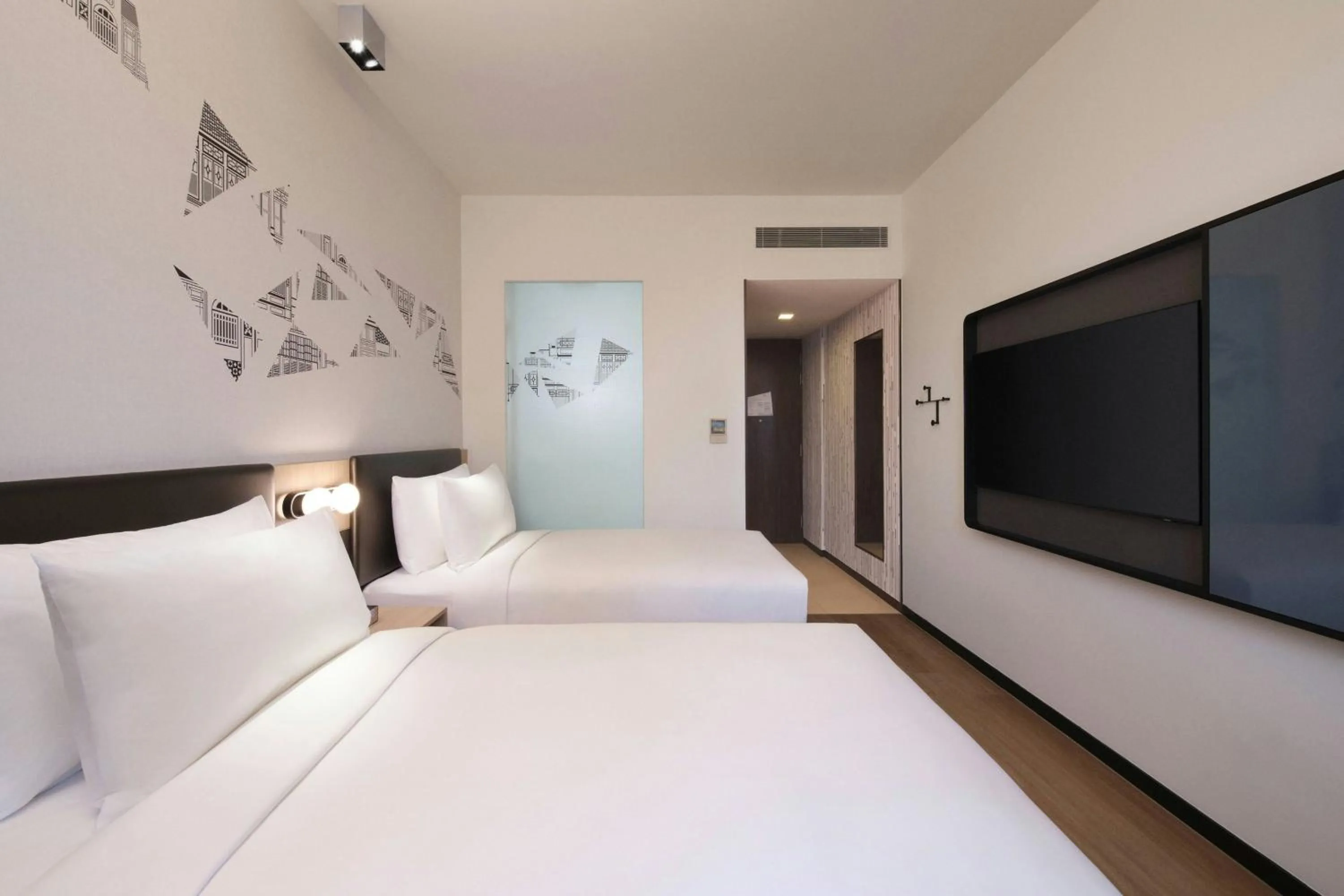 Photo of the whole room, Bed in Aloft Singapore Novena