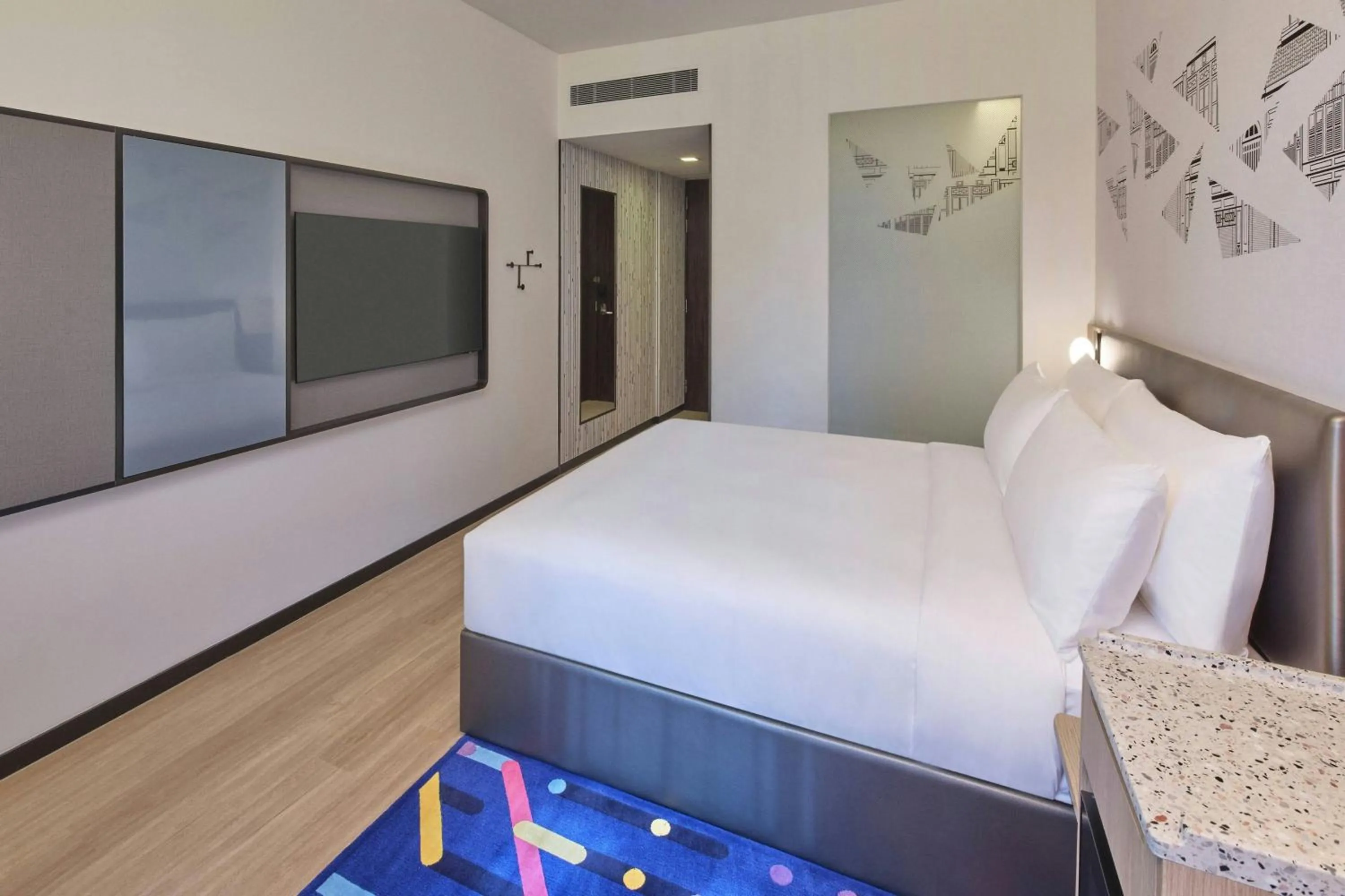 Photo of the whole room, Bed in Aloft Singapore Novena