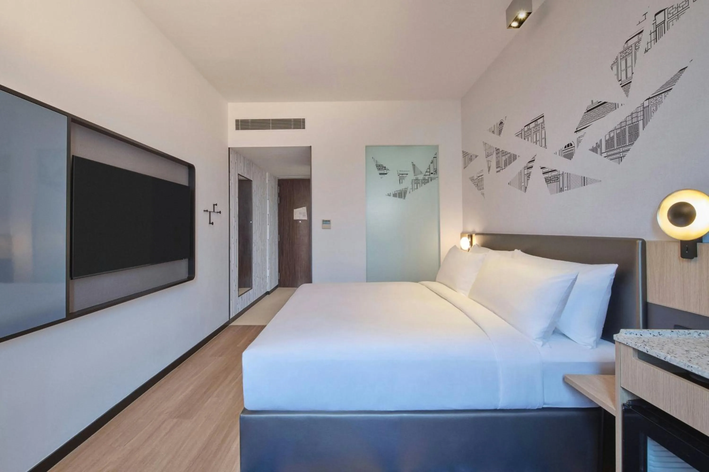 Photo of the whole room, Bed in Aloft Singapore Novena