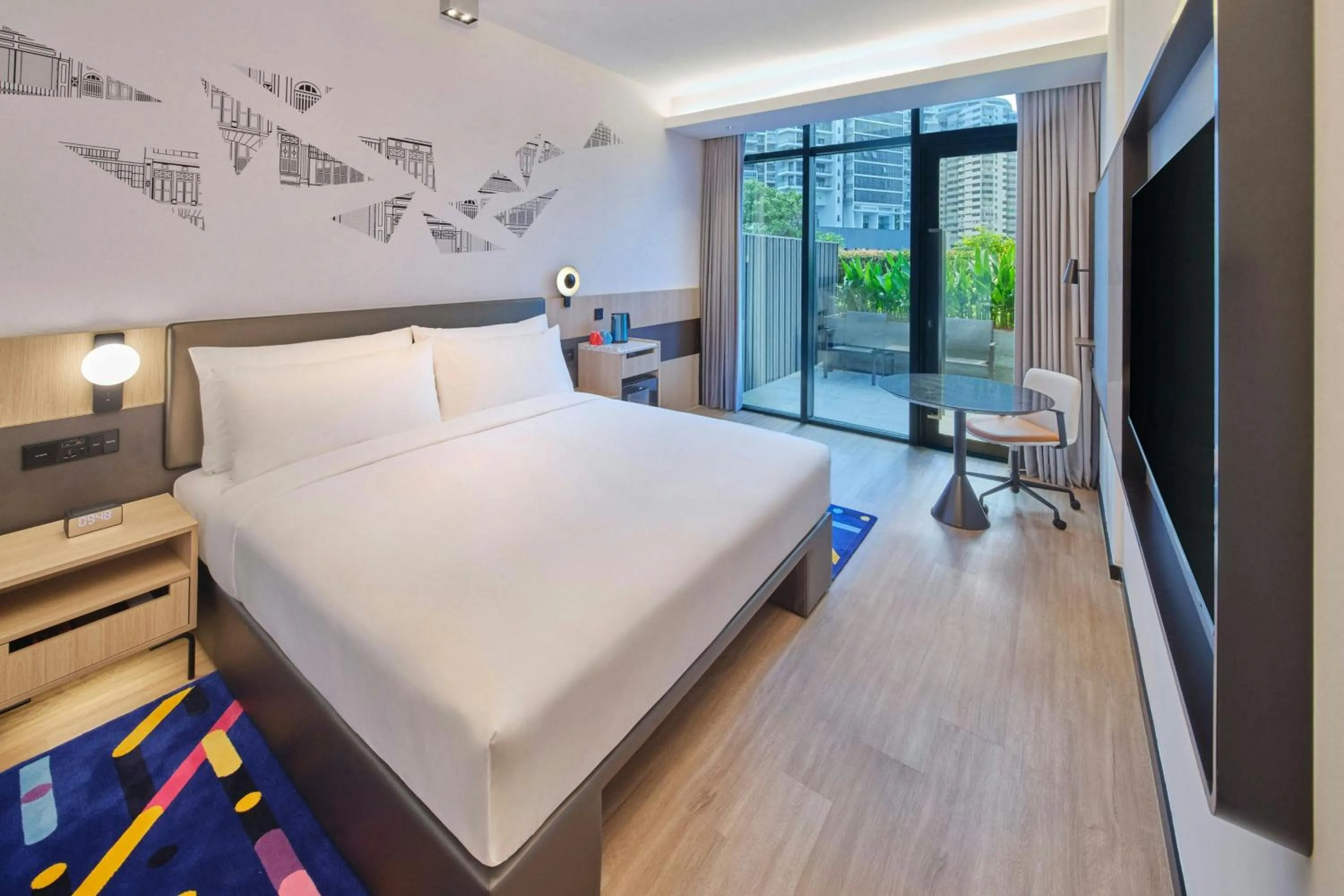 Photo of the whole room, Bed in Aloft Singapore Novena