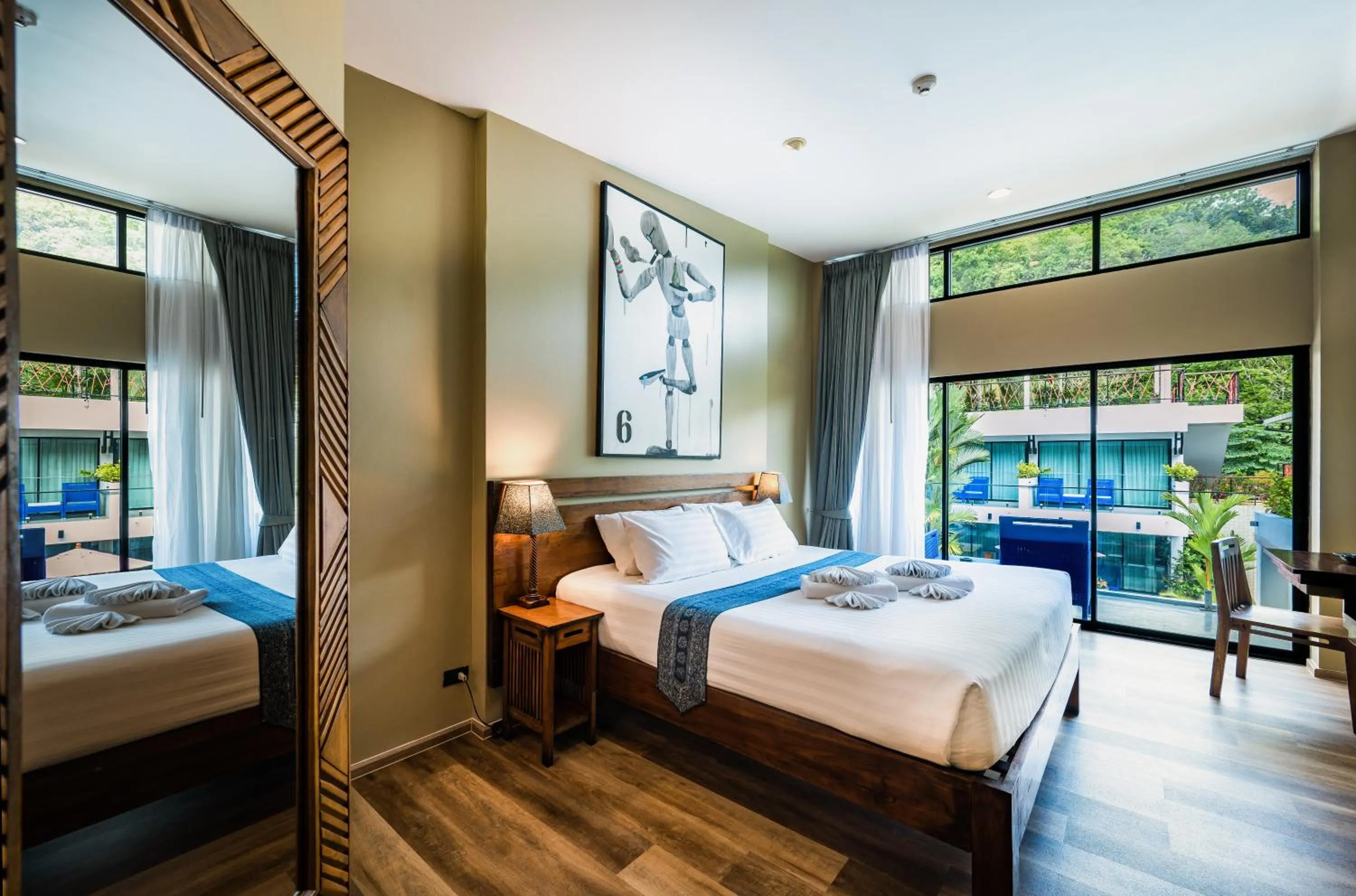 Photo of the whole room, Bed in CC's Hideaway Kata - SHA Plus