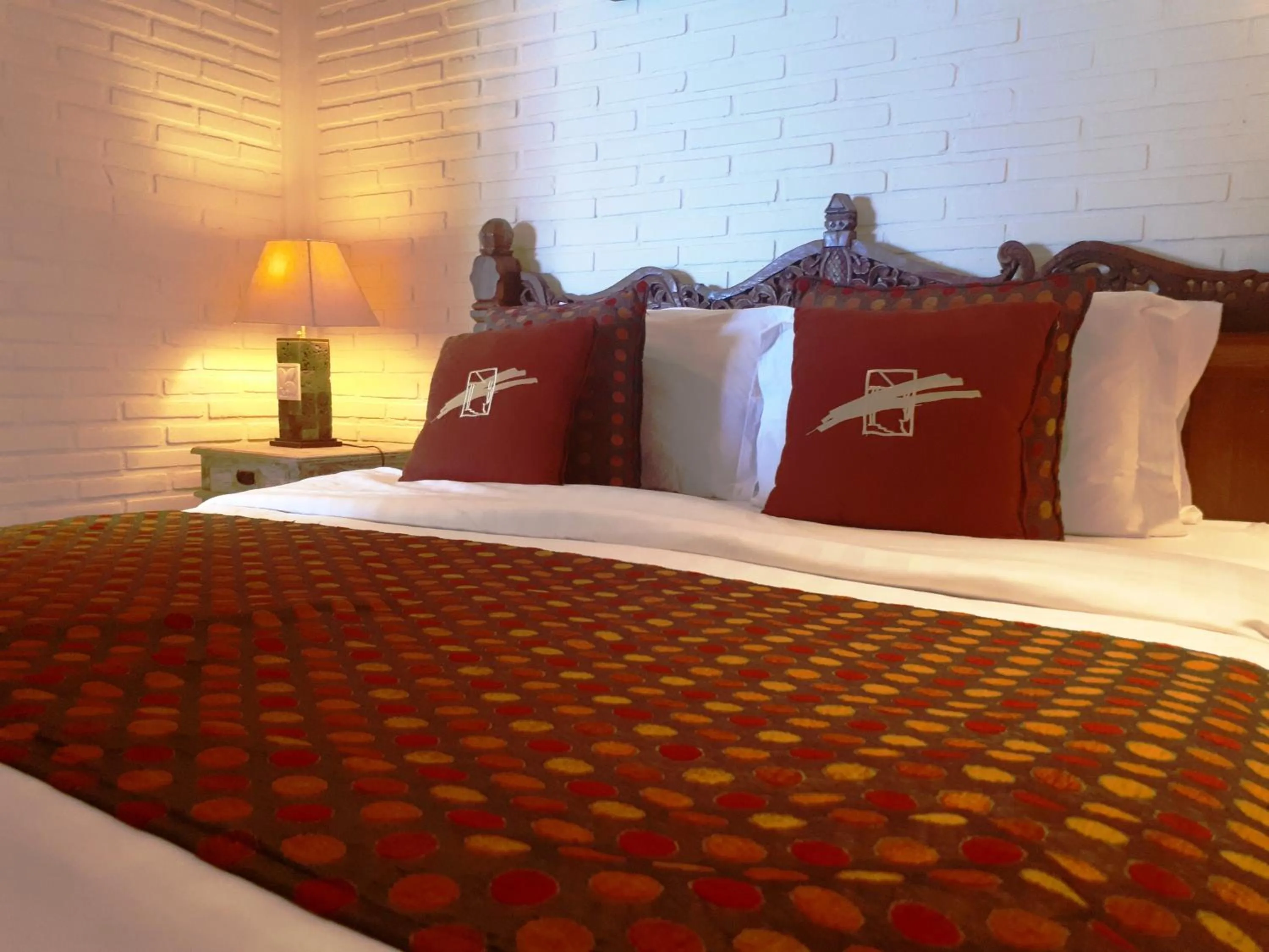 Bed in Tauch Terminal Resort Tulamben & Spa