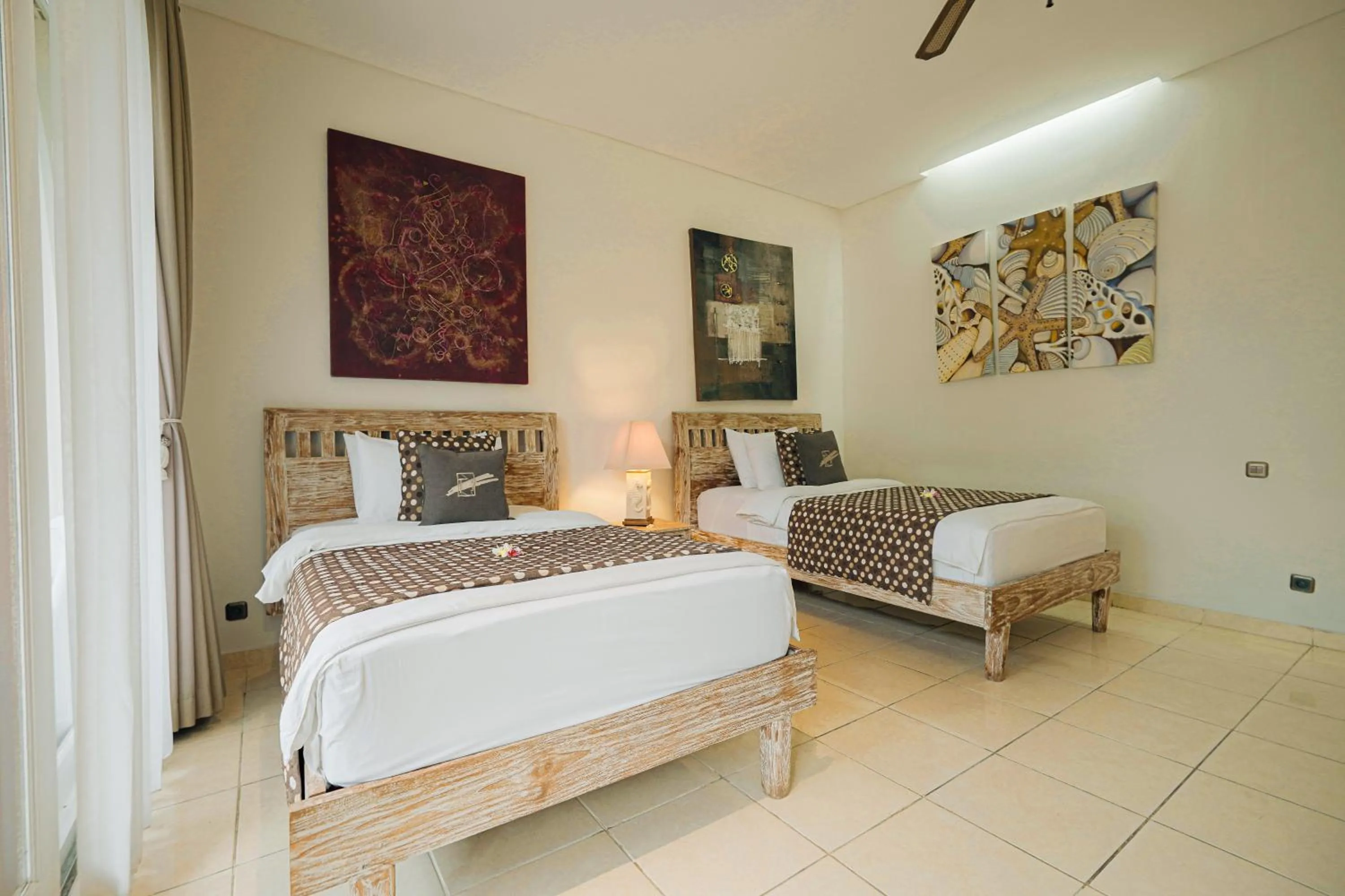 Bed in Tauch Terminal Resort Tulamben & Spa