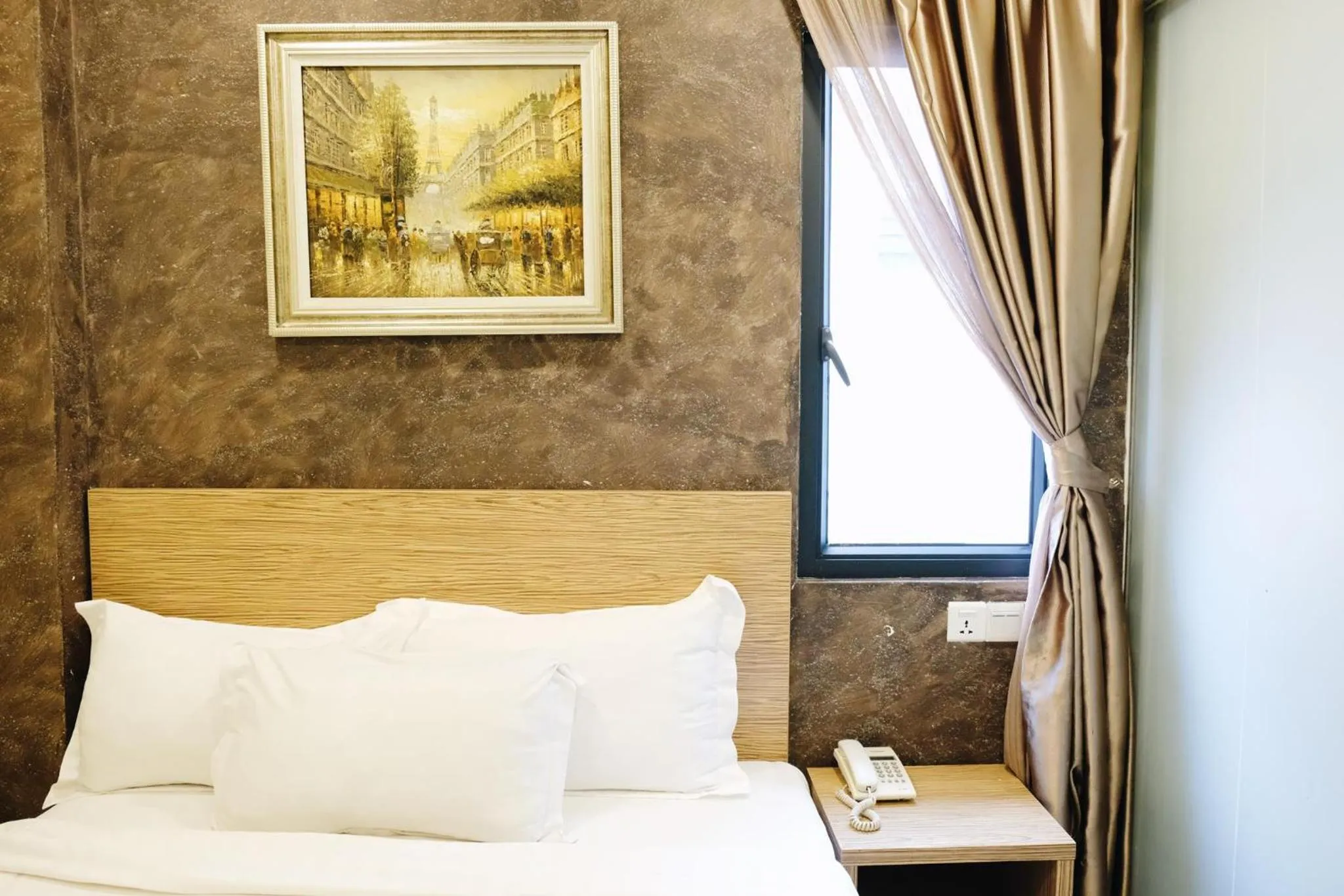 Bed in Era Plus Hotel