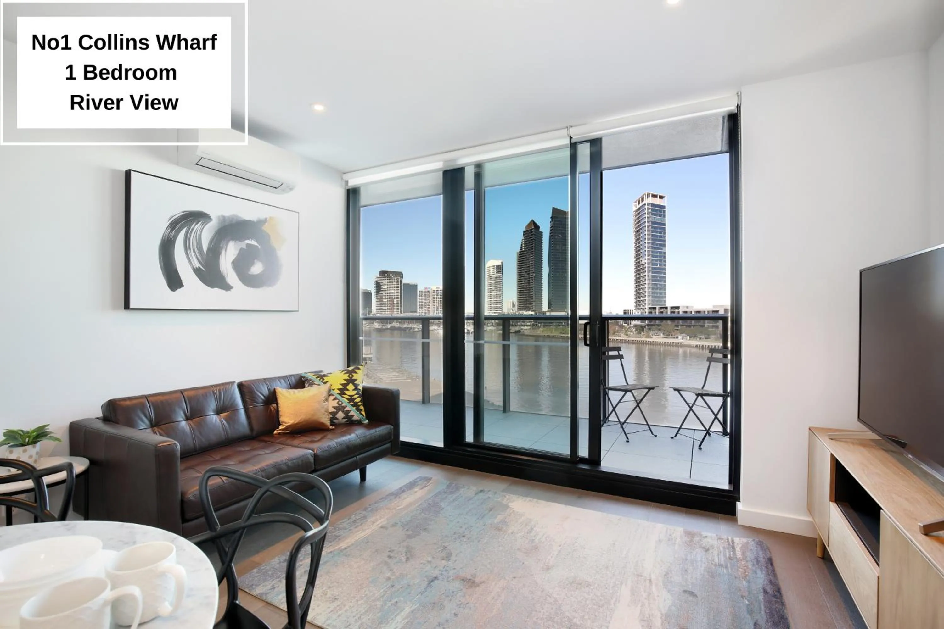 Living room in Orange Stay at Collins Wharf
