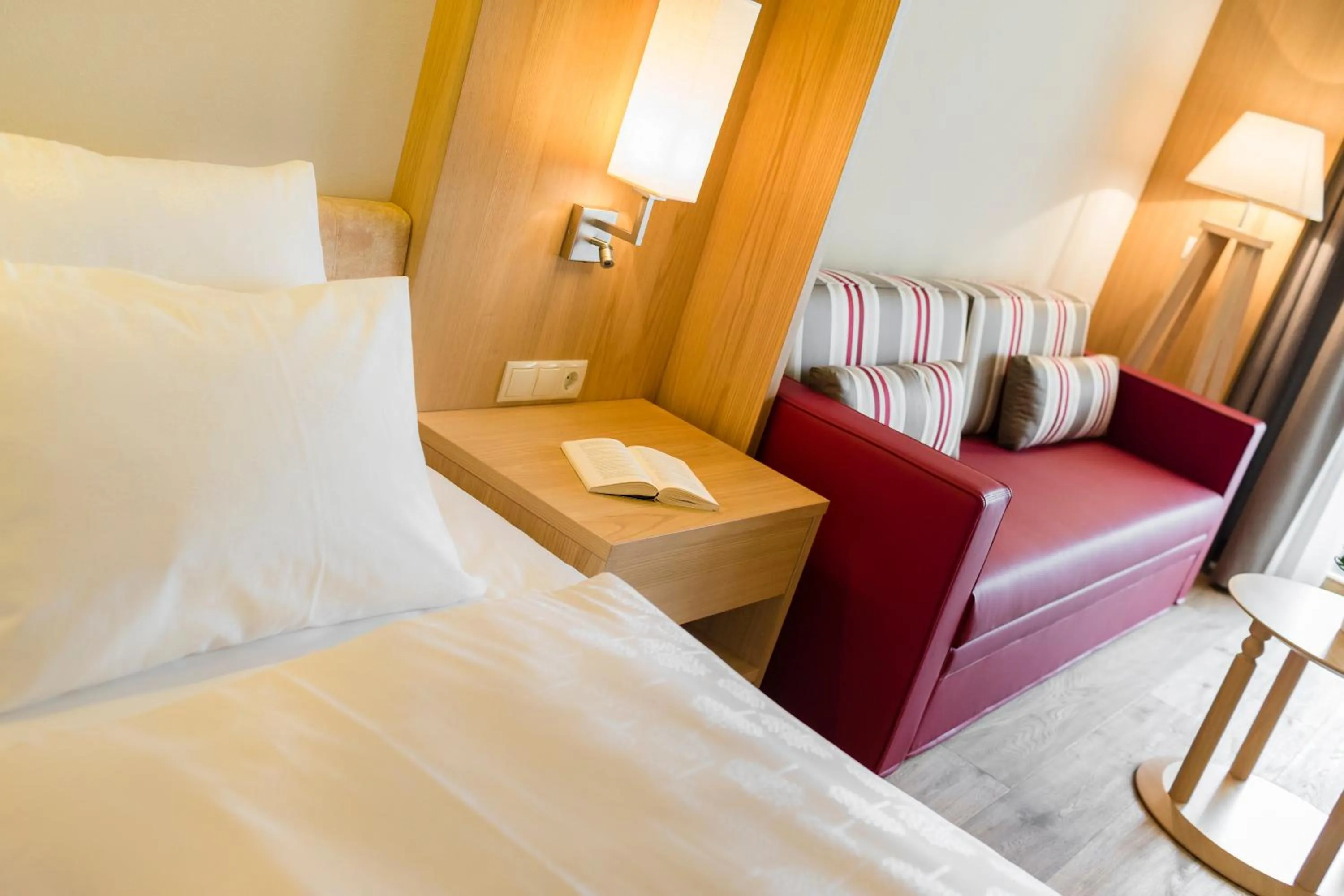 Seating area, Bed in Hotel Hasslhof