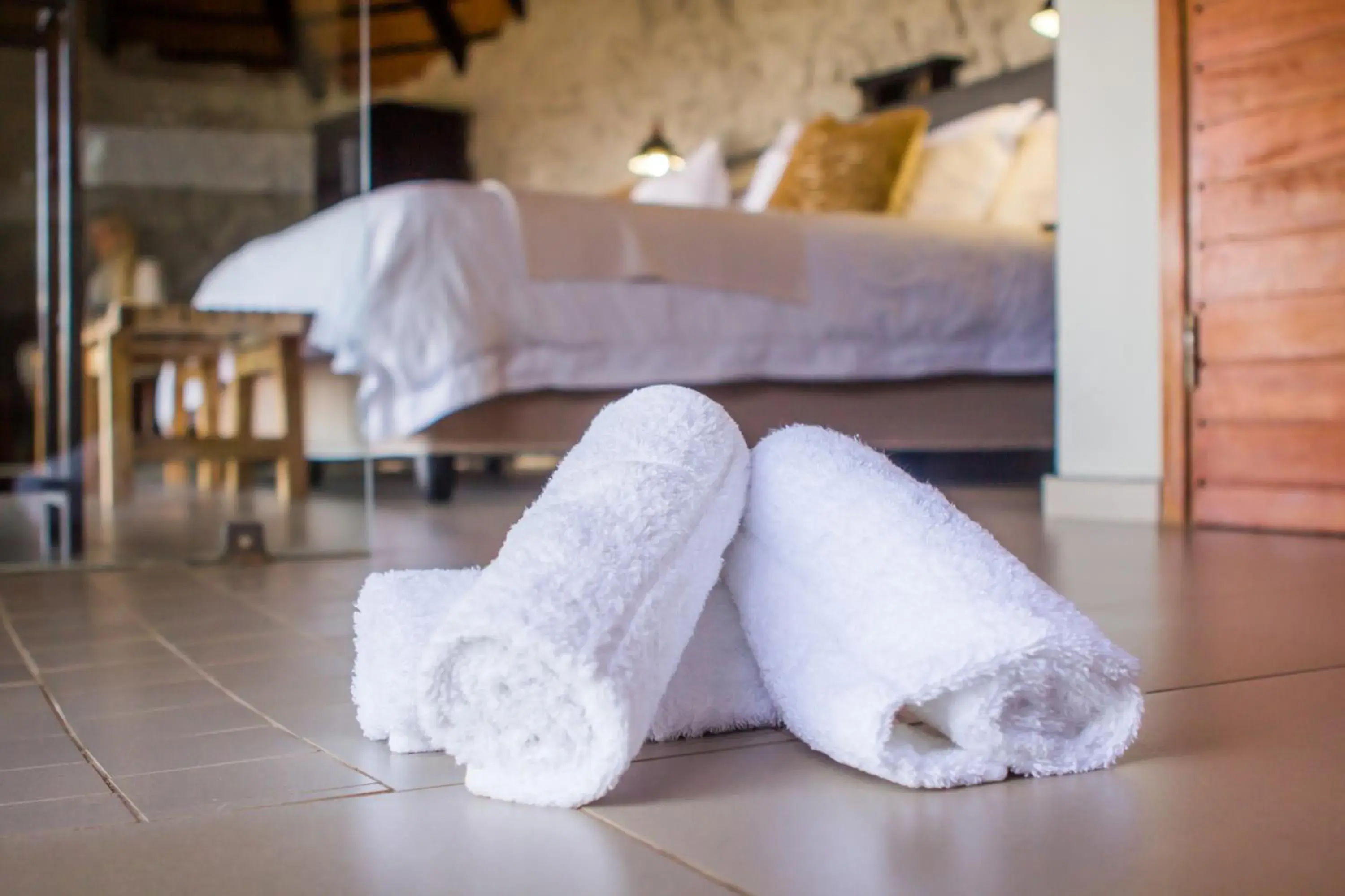 Shower, Bed in Leopard Mountain Safari Lodge Shower, Bed in Leopard Mountain Safari Lodge