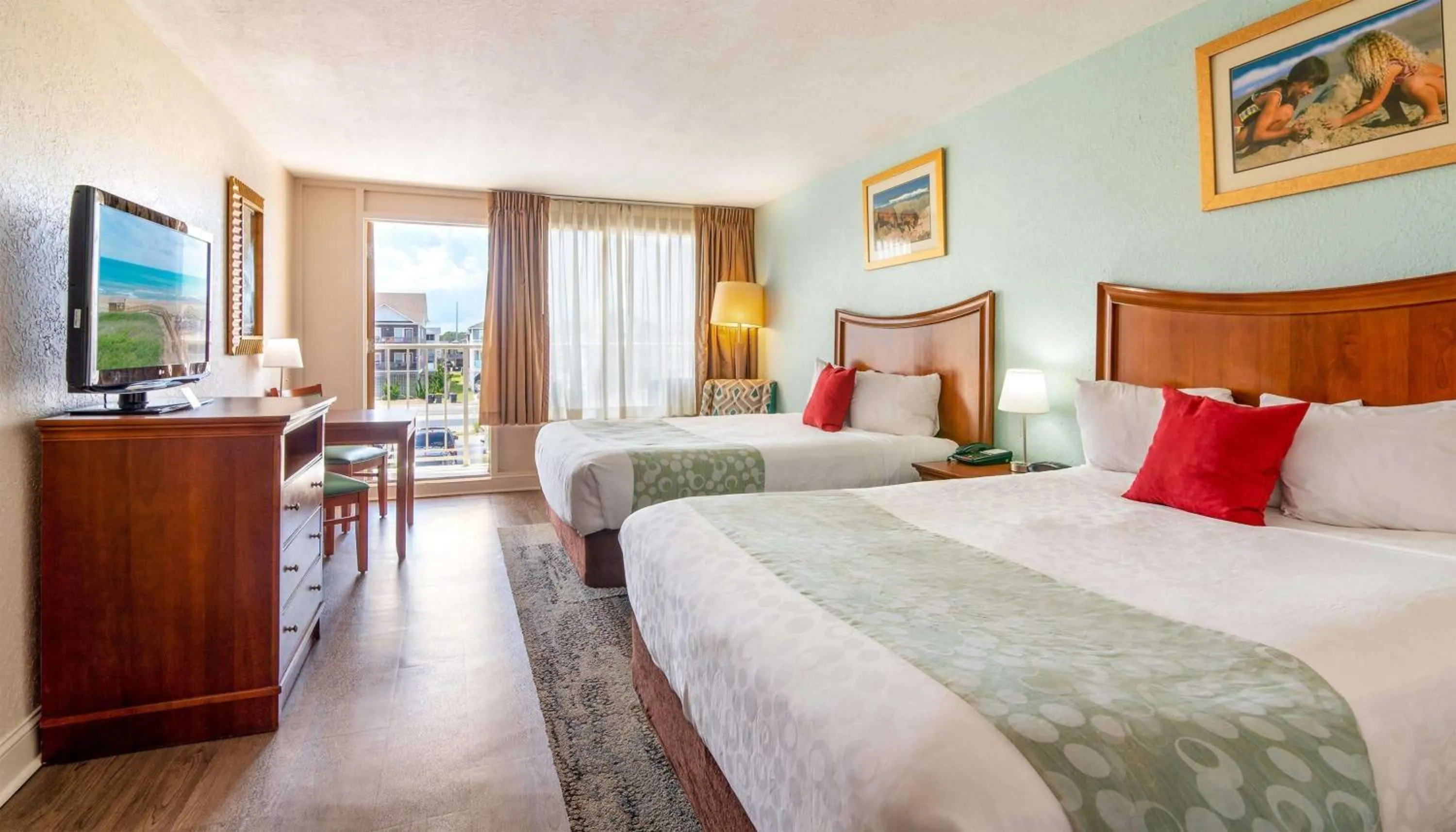 Photo of the whole room, Bed in Ramada Plaza by Wyndham Nags Head Oceanfront