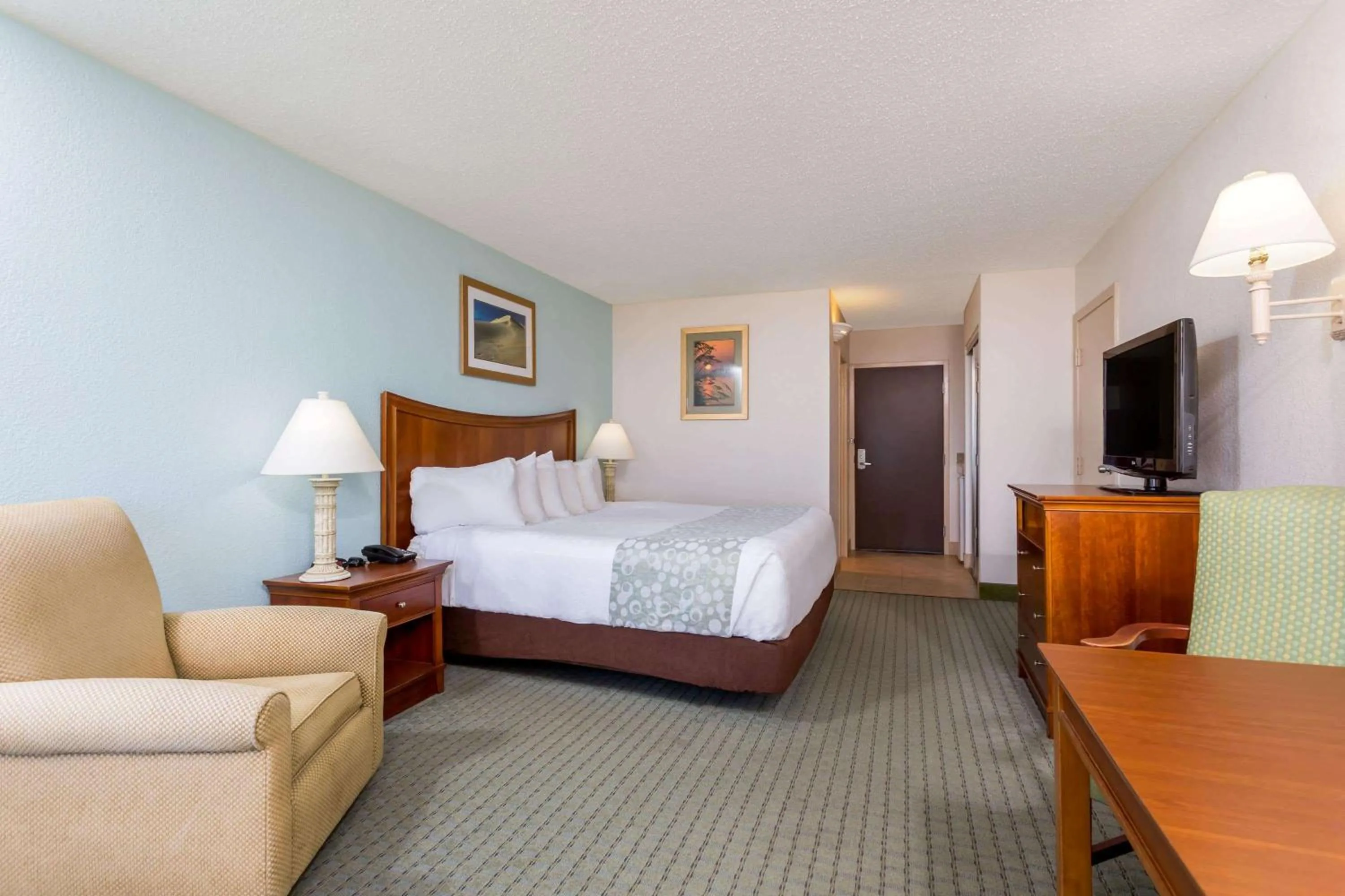 Photo of the whole room, Bed in Ramada Plaza by Wyndham Nags Head Oceanfront