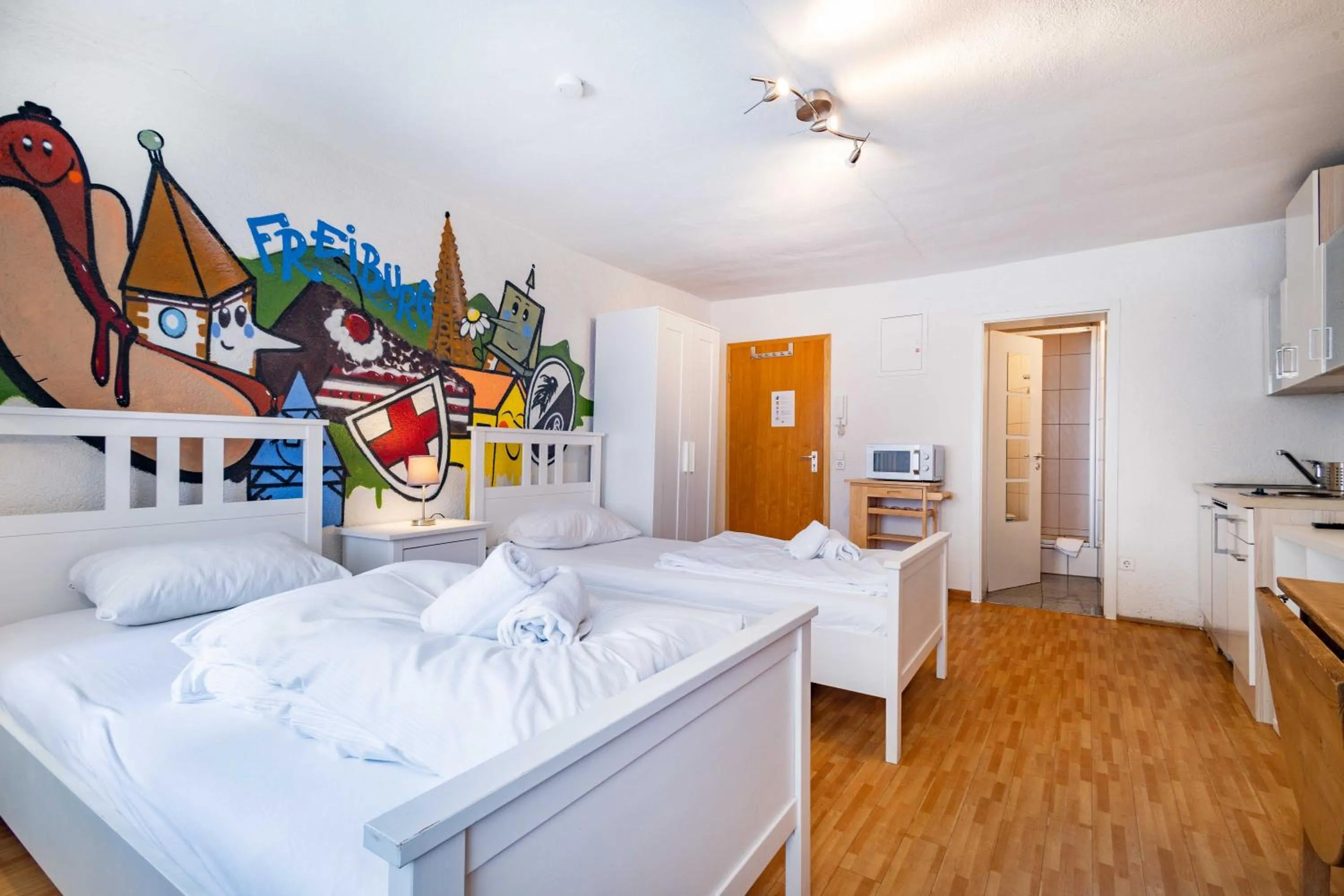 Bed in StayInn Apartments City Center