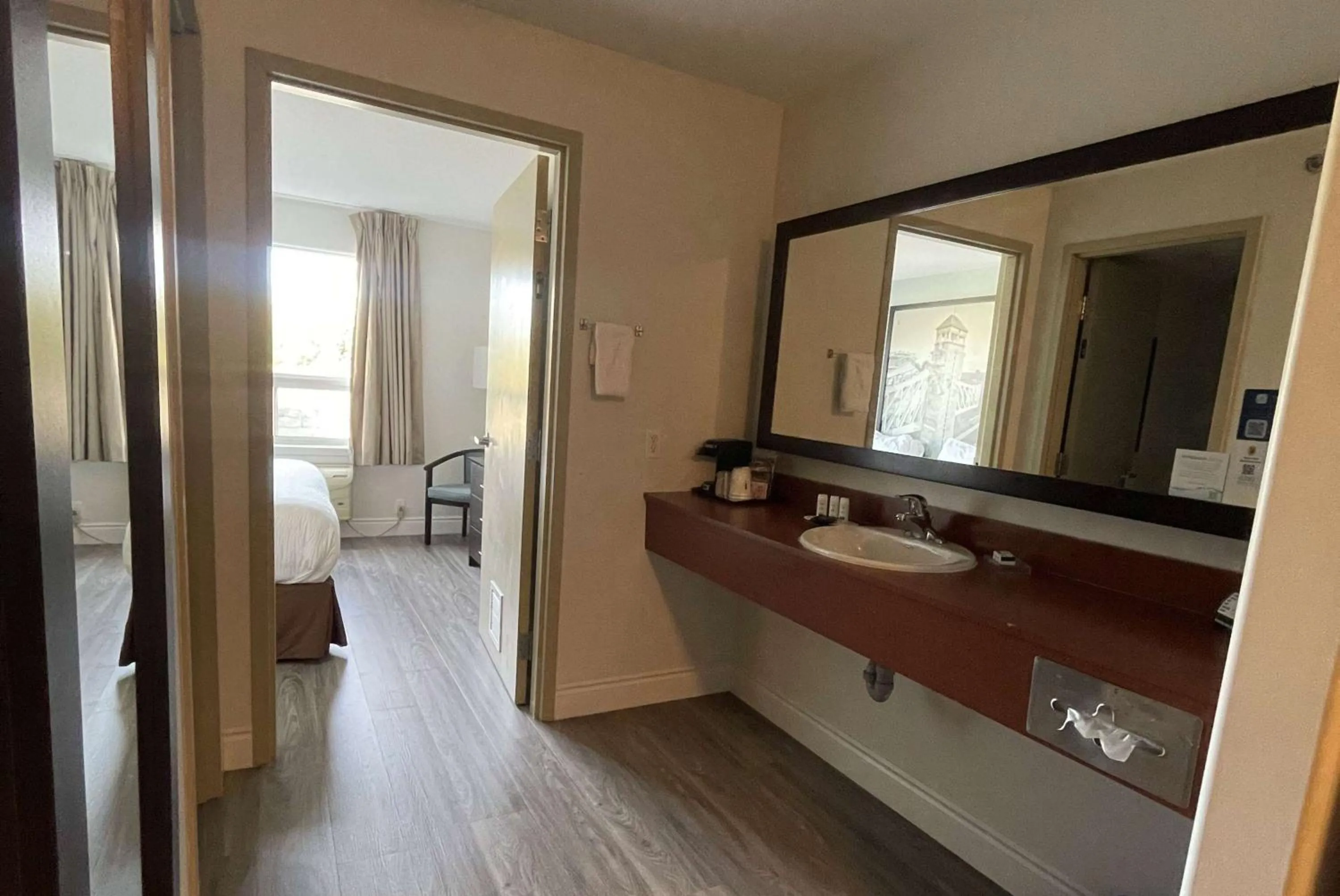 Bathroom, Bed in Super 8 by Wyndham Peterborough