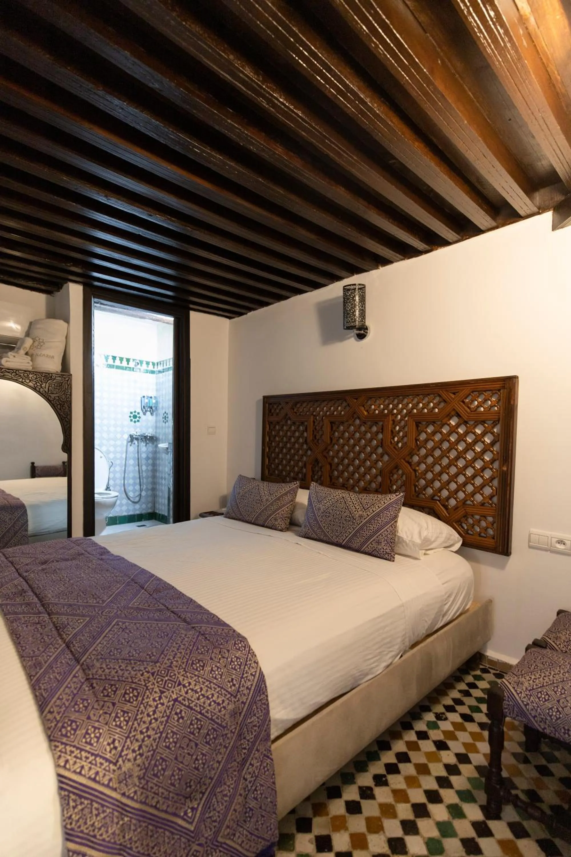 Bed in Le Grand Alcazar - Riad