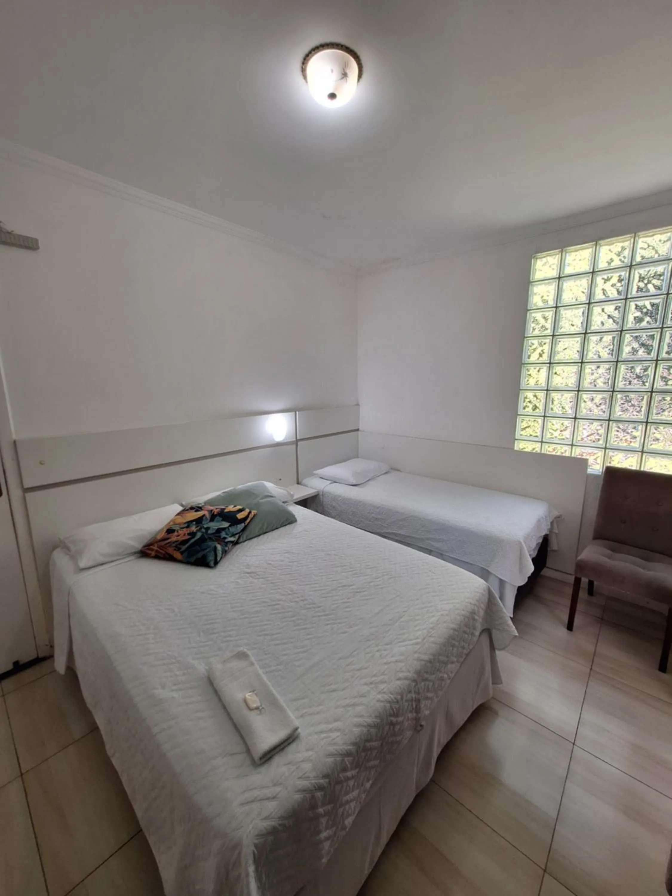 Quadruple Room in Hotel Hospedagem Palhoça com piscina