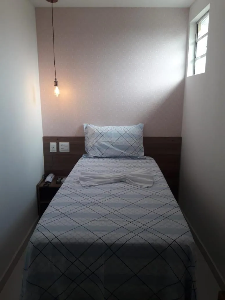 Bed in Pousada Aliança