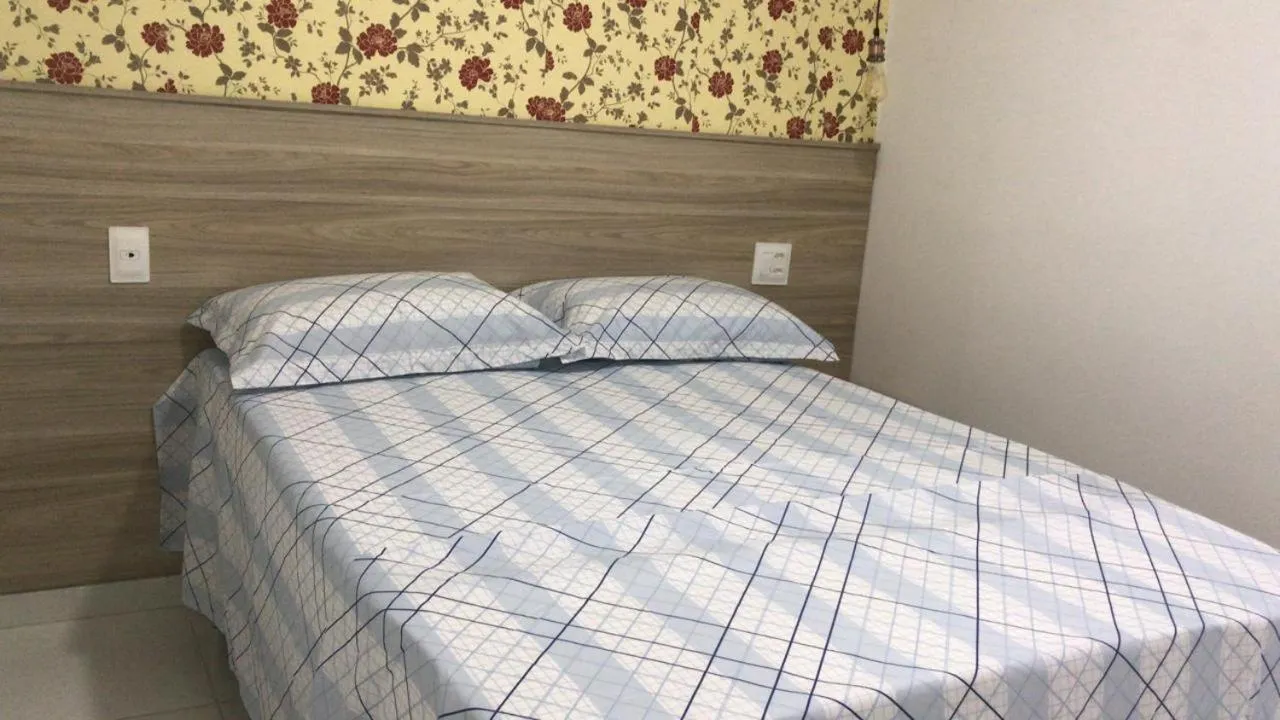 Bed in Pousada Aliança