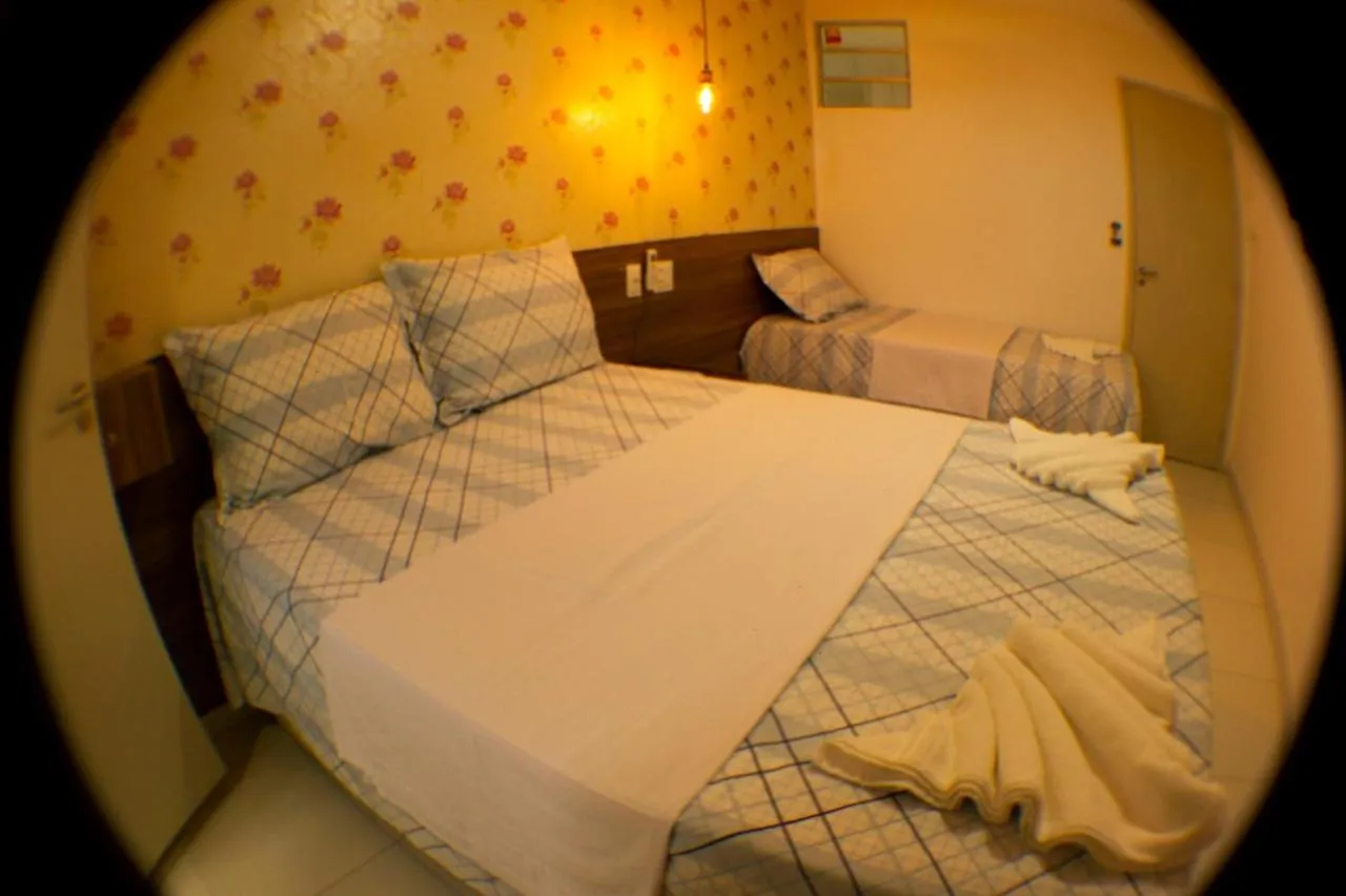 Bed in Pousada Aliança