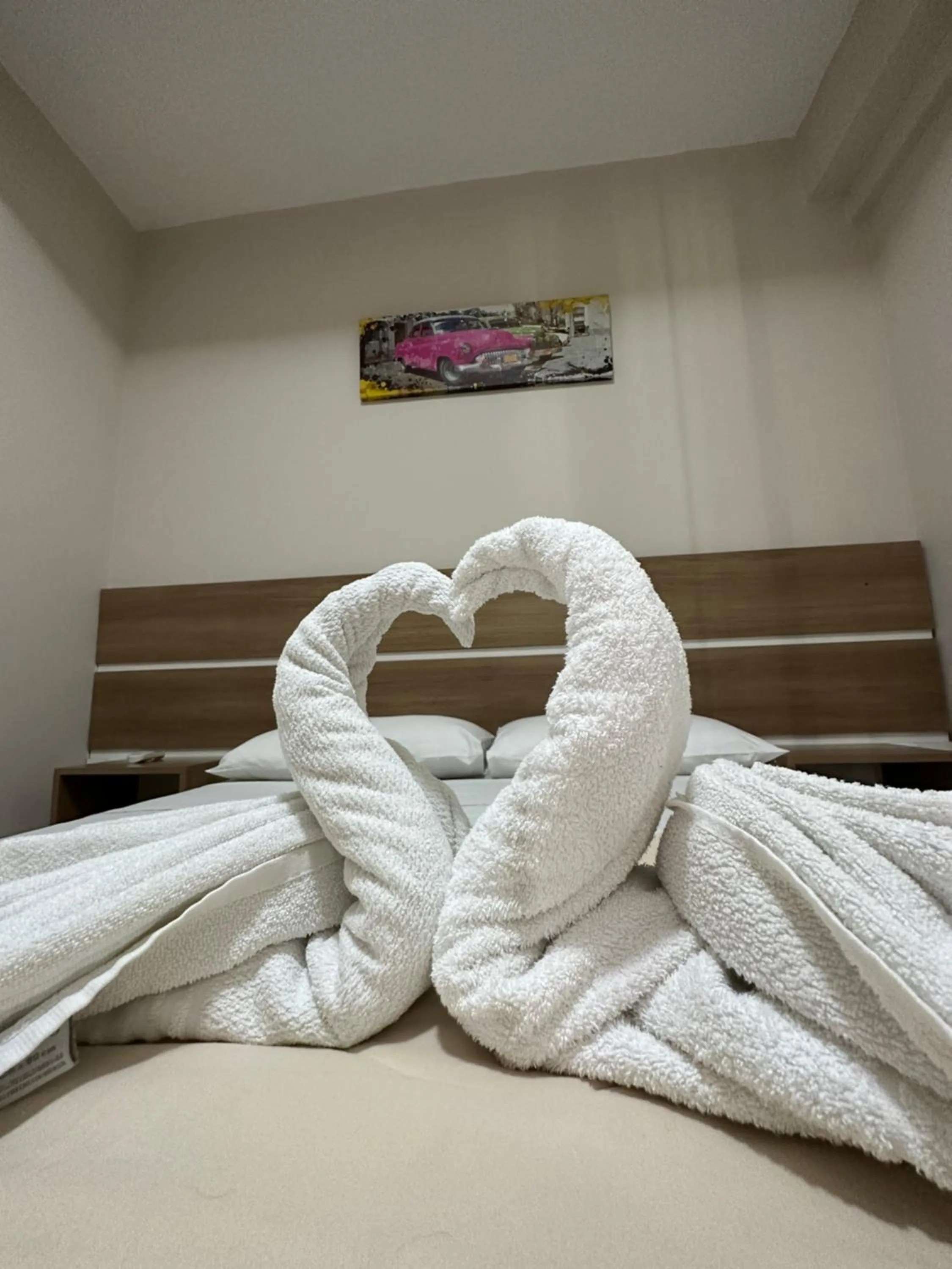 towels, Bed in Pousada Brisa do Mar