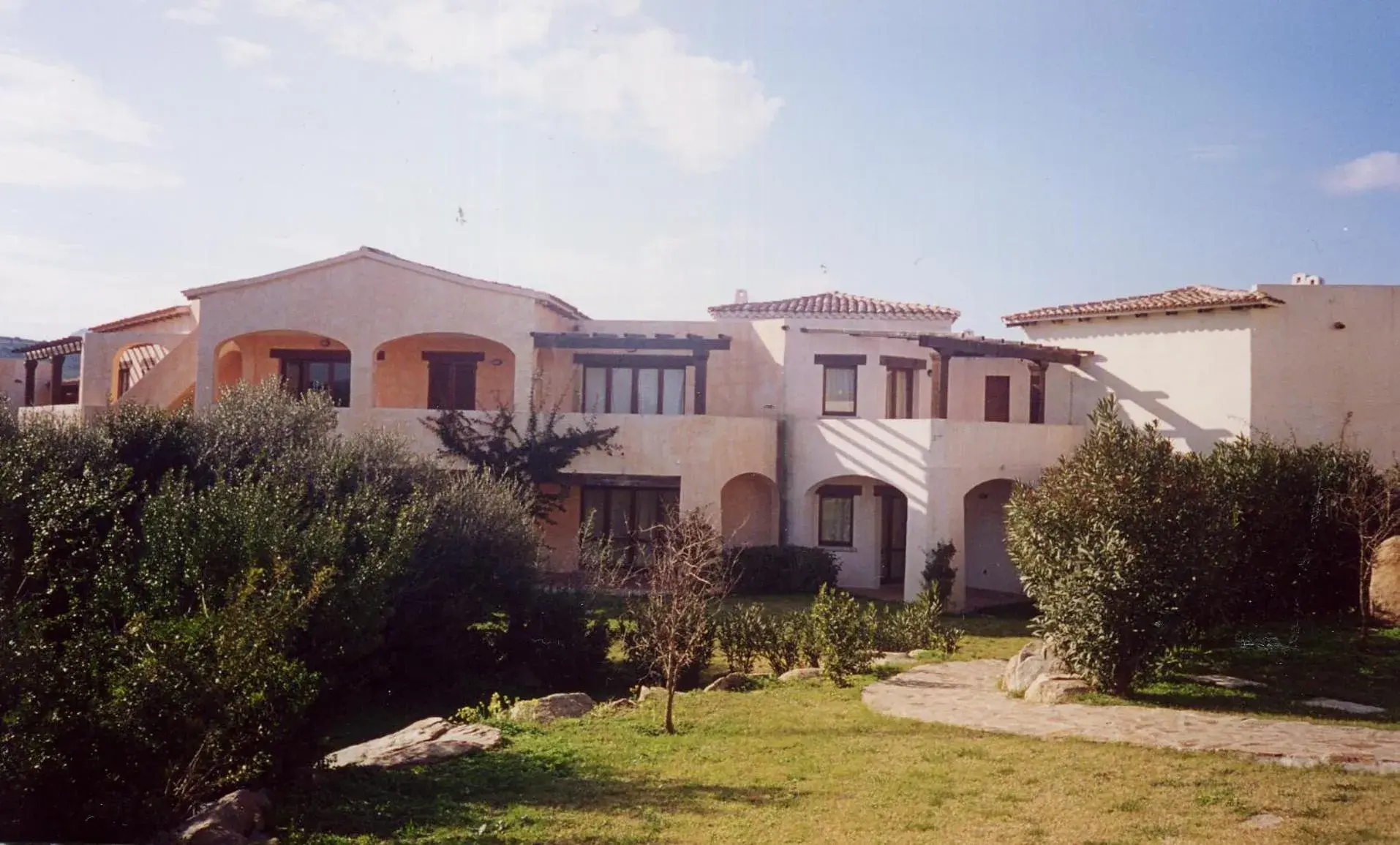 Property building in Le Corti di Marinella Property building in Le Corti di Marinella
