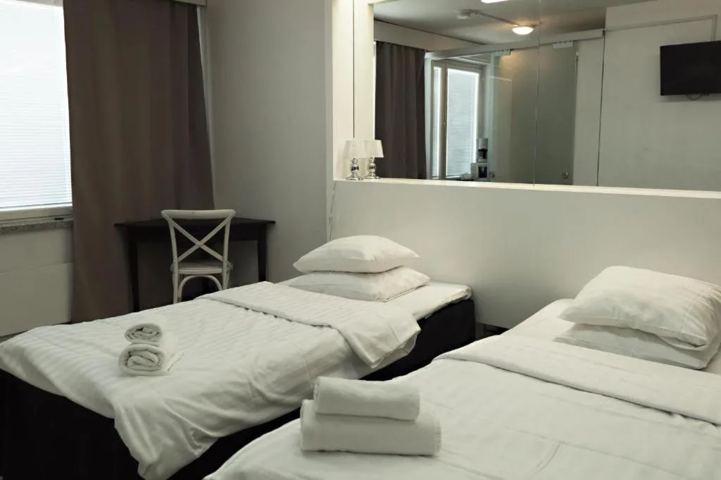 Bed in Hotel Alexander