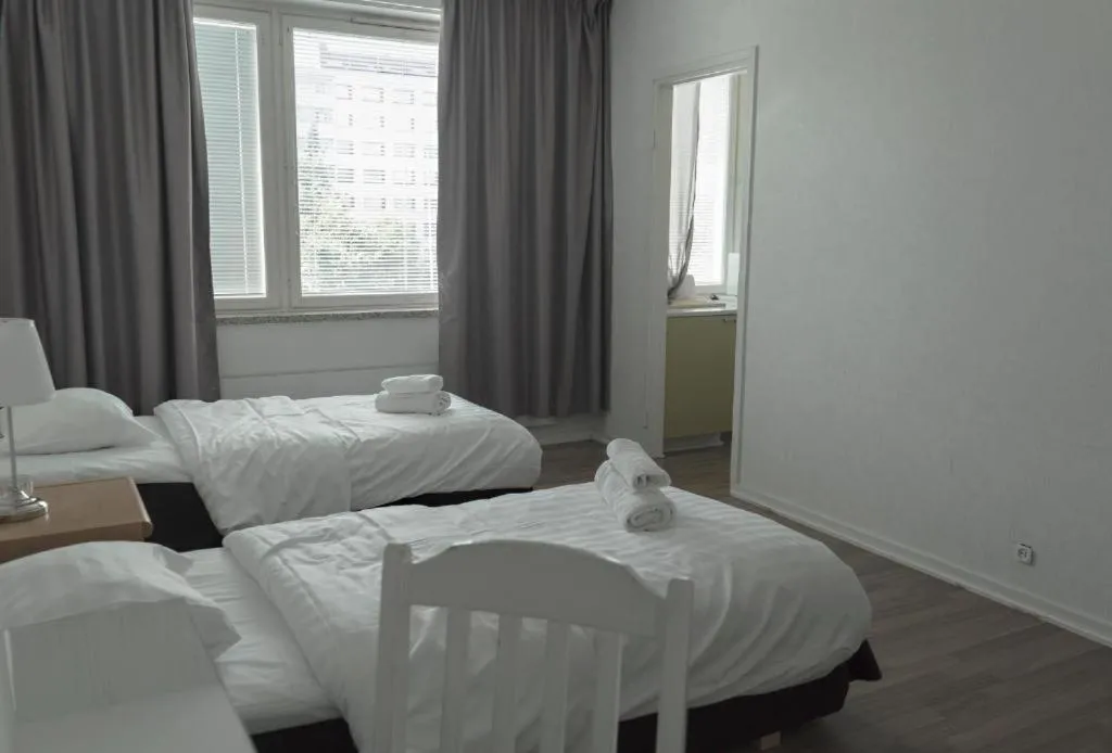 Bed in Hotel Alexander