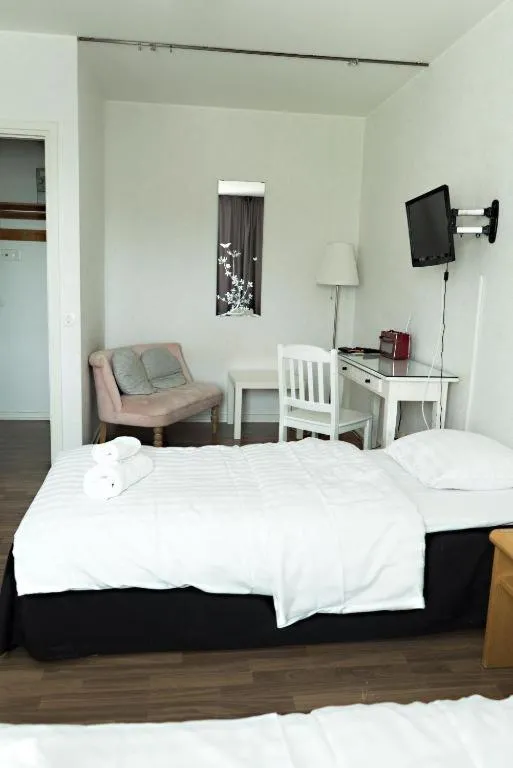 Bed in Hotel Alexander