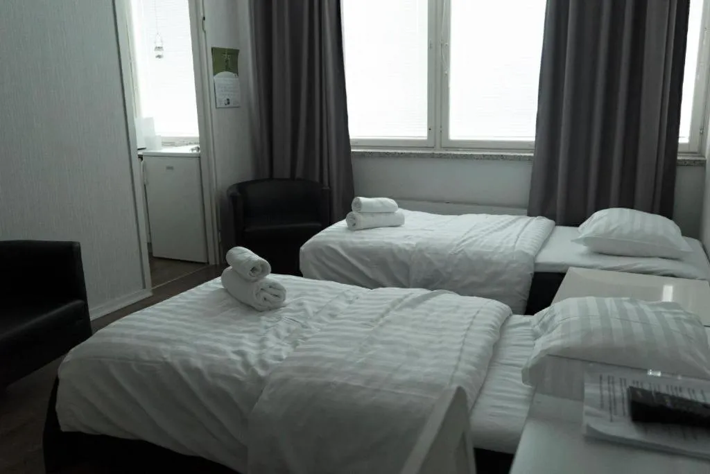 Bed in Hotel Alexander