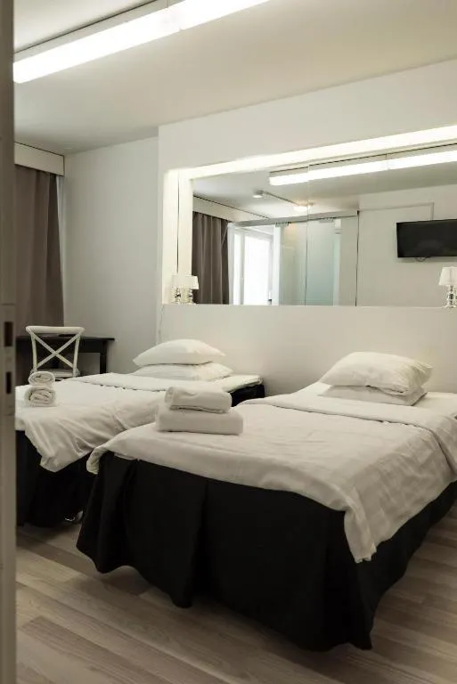Bed in Hotel Alexander
