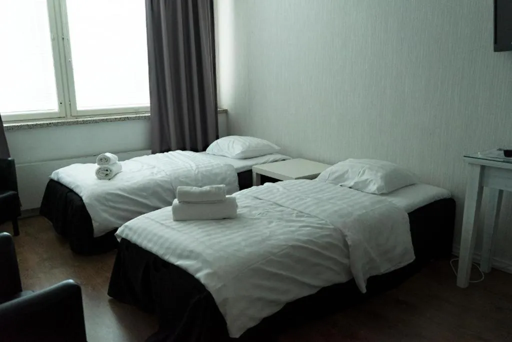 Bed in Hotel Alexander