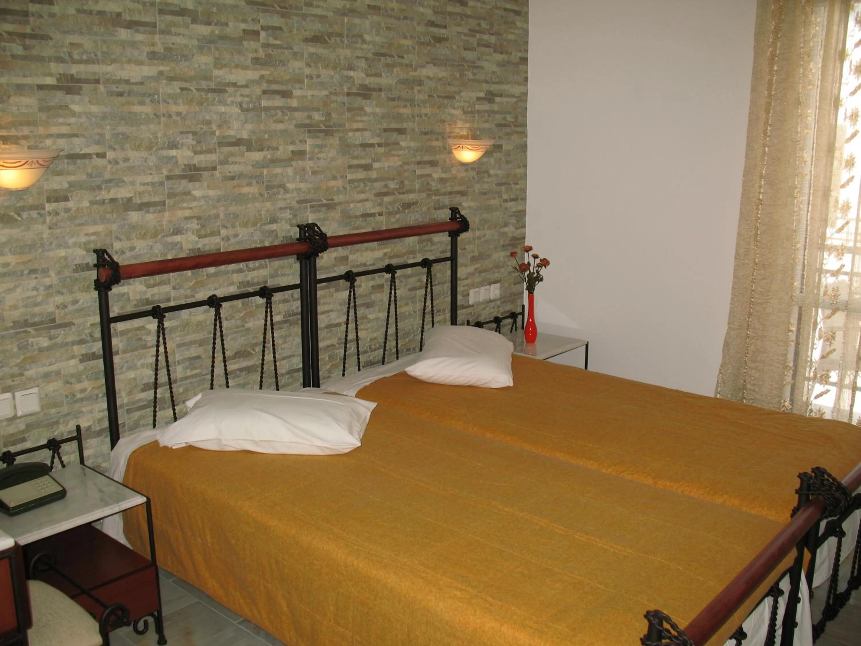 Photo of the whole room, Bed in Iliovasilema