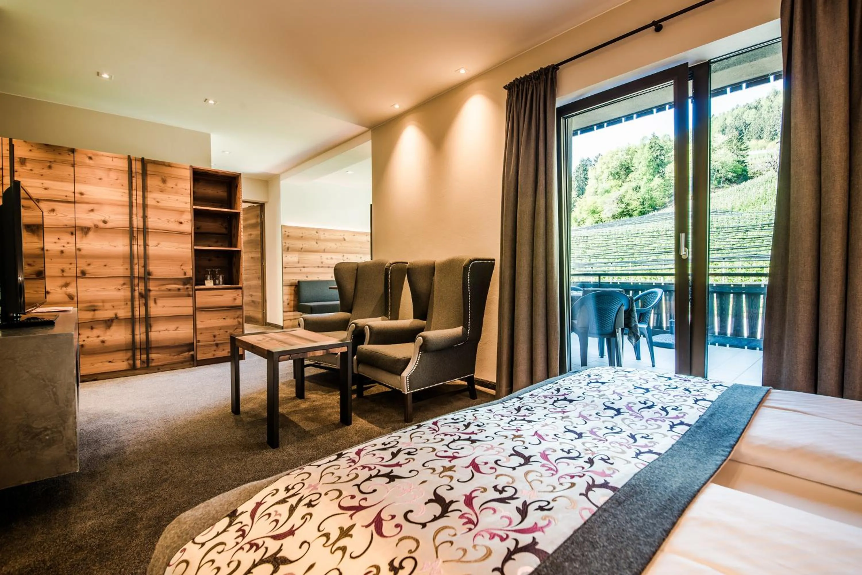 Living room, Bed in Hotel Restaurant Kirchsteiger