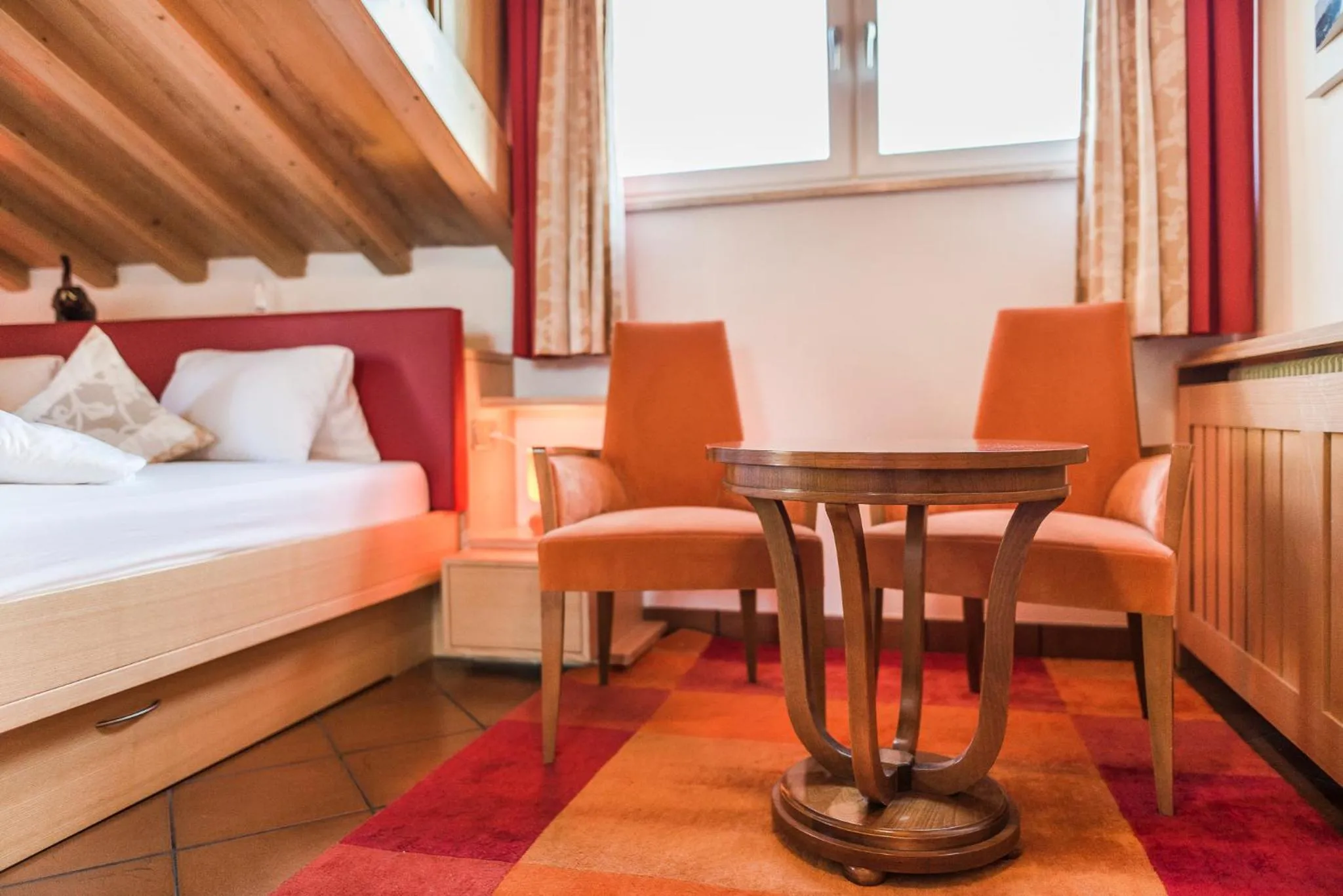Seating area, Bed in Hotel Restaurant Kirchsteiger
