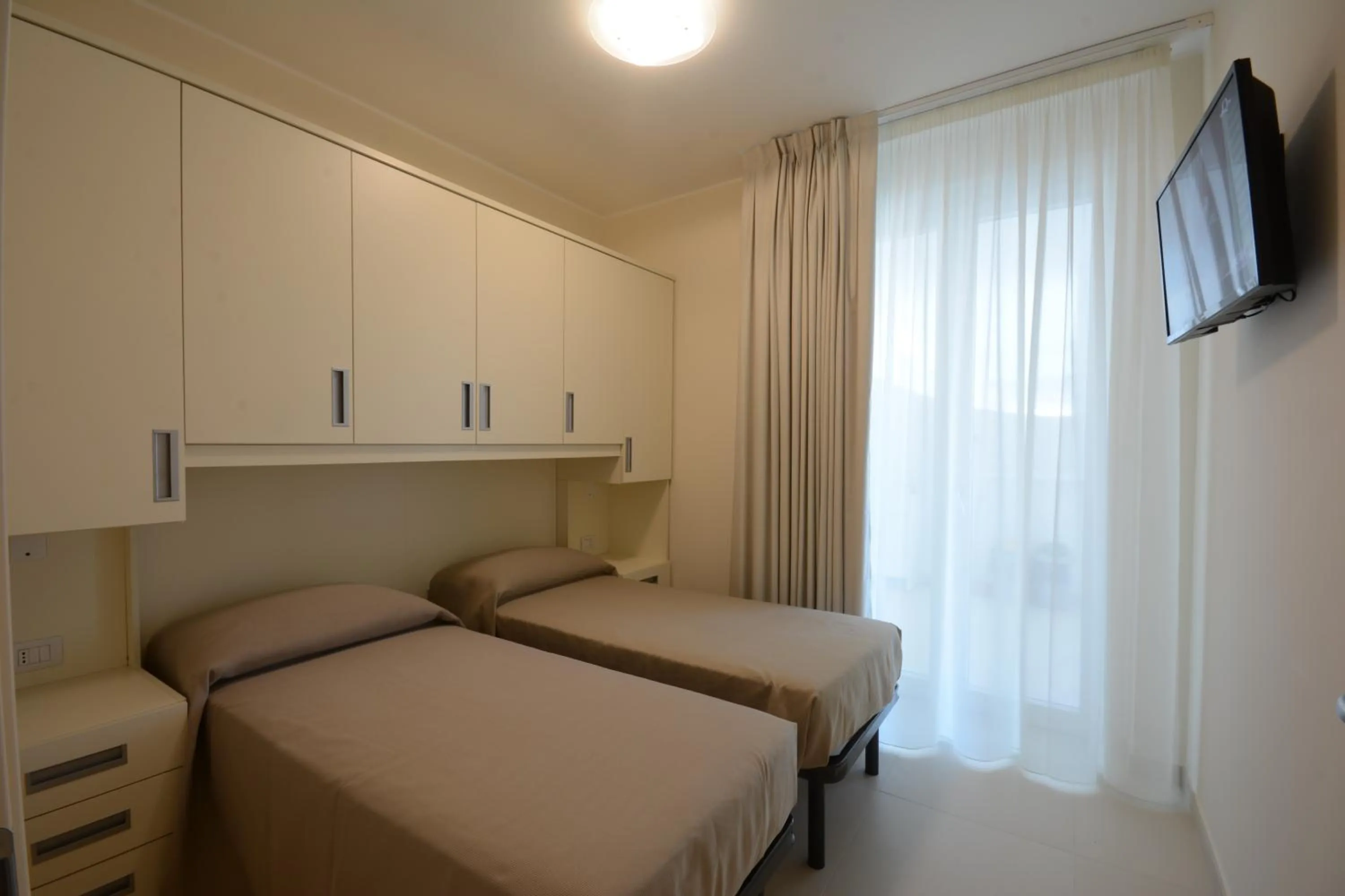 Bed in Residence La Villa