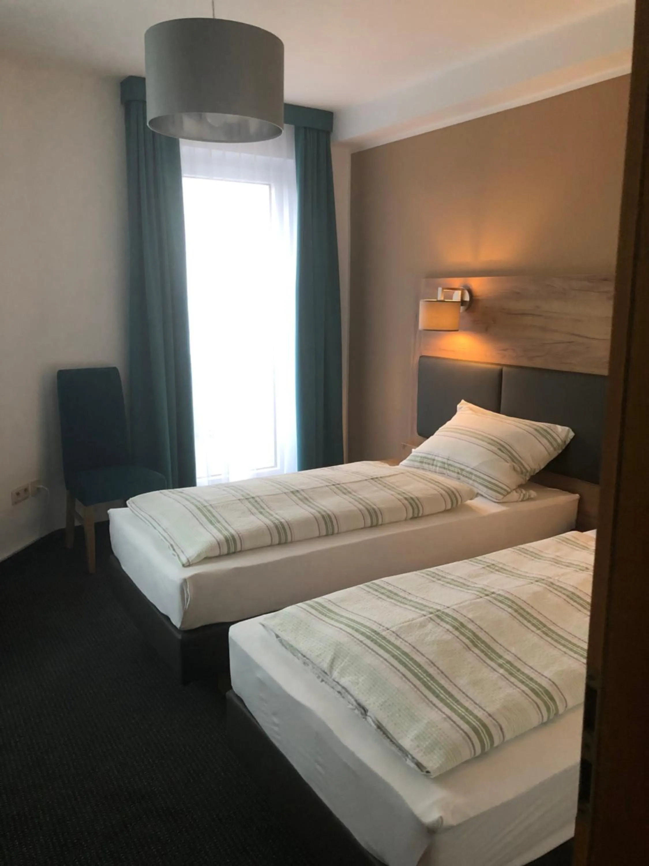 Photo of the whole room, Bed in Burghotel Homberg