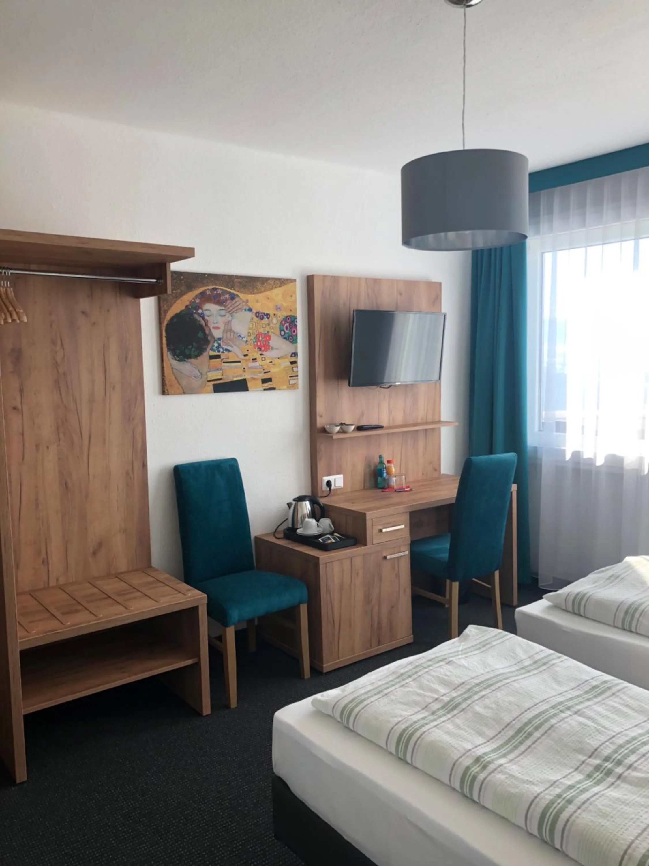 Photo of the whole room, Bed in Burghotel Homberg