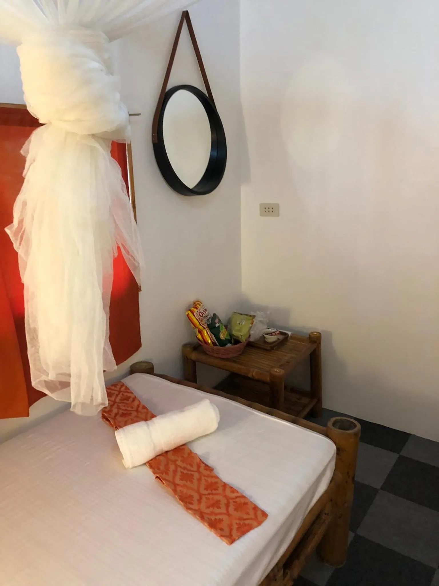 Bed in Cuestas Beach Resort and Restaurant