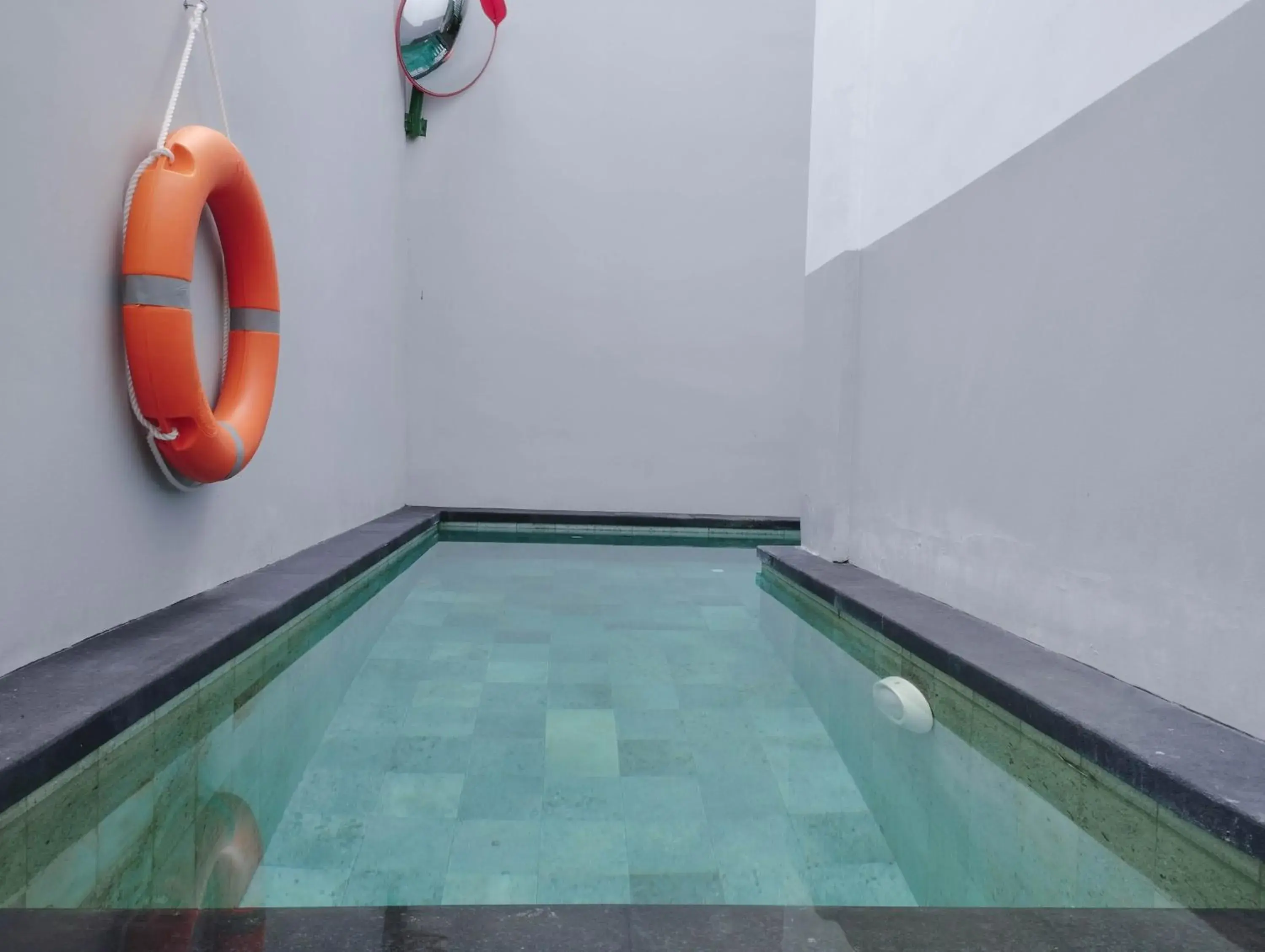 Swimming pool in Ara Inn Bed And Breakfast by ecommerceloka Swimming pool in Ara Inn Bed And Breakfast by ecommerceloka