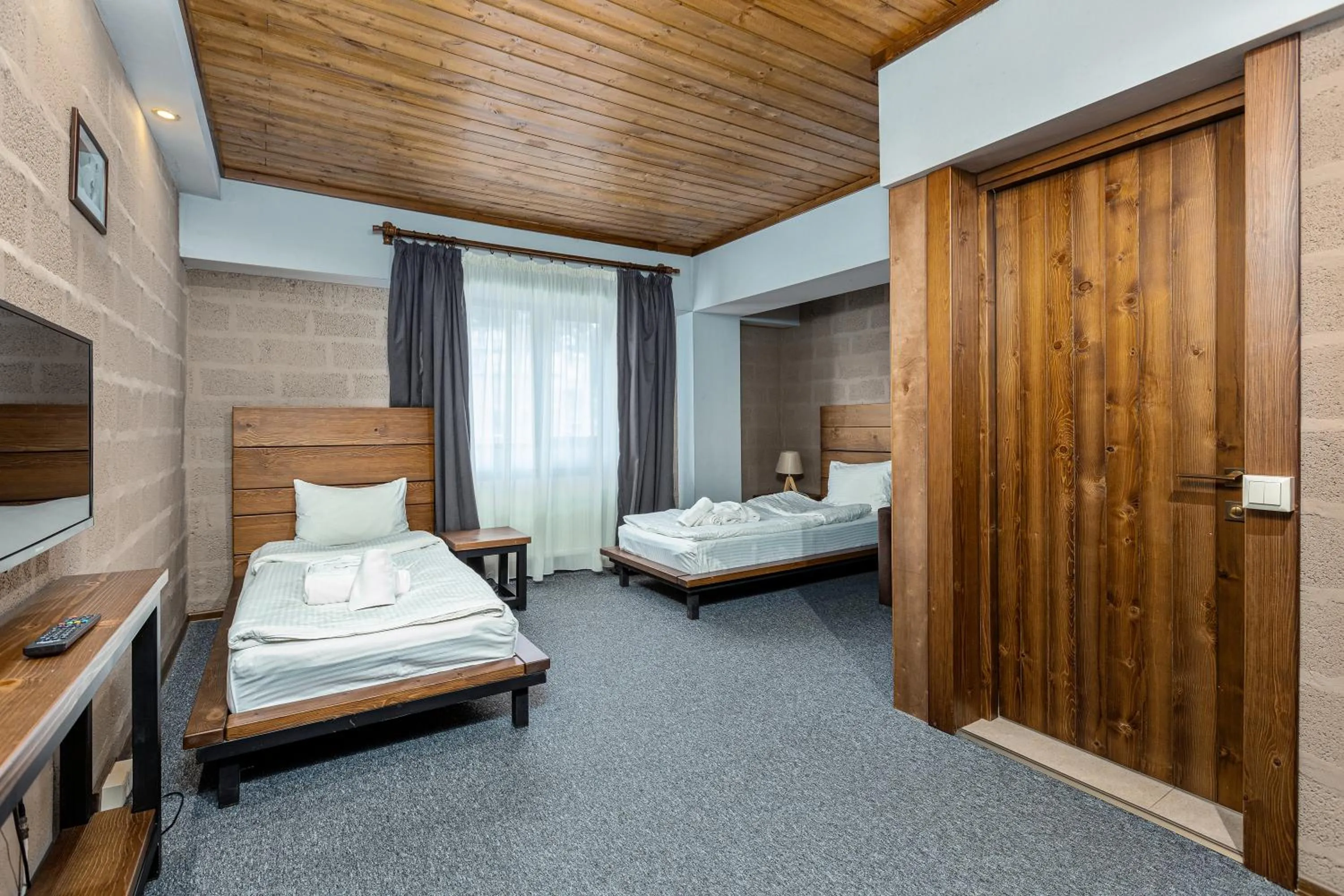 Bedroom in Alpine Lounge Boutique Hotel