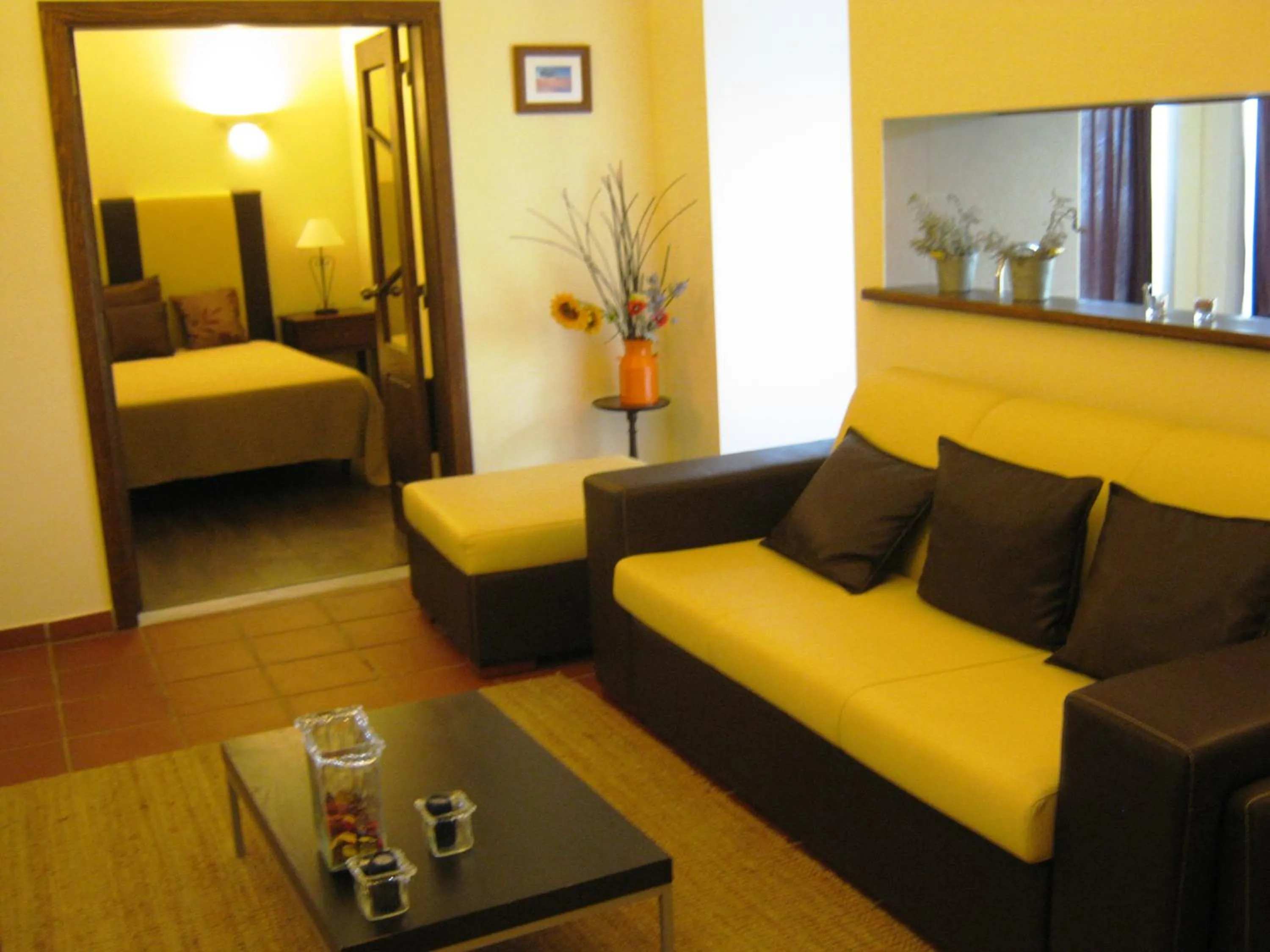 Communal lounge/ TV room, Bed in Herdade da Diabroria - Agroturismo