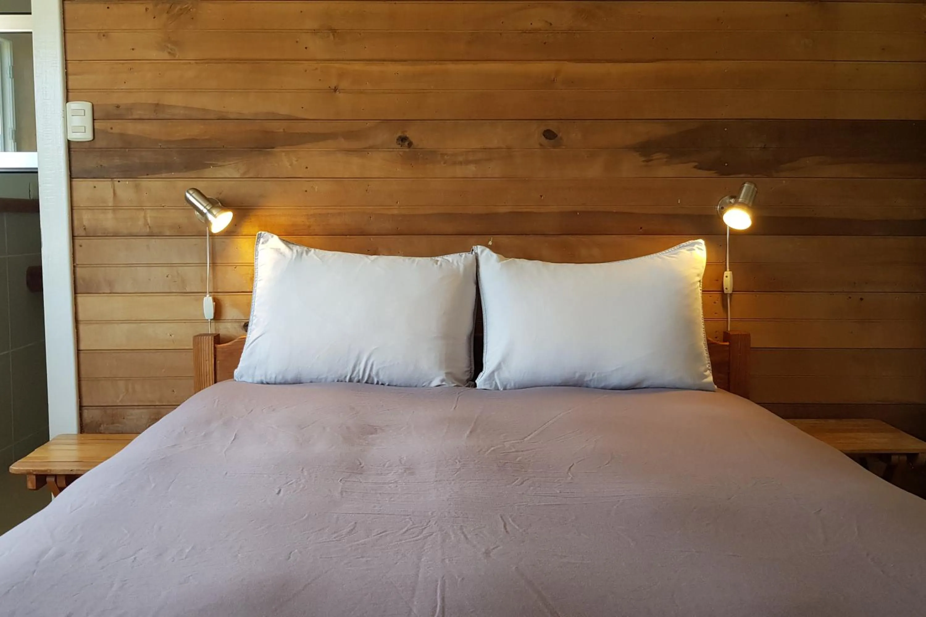 Bed in Hostal Compass del Sur