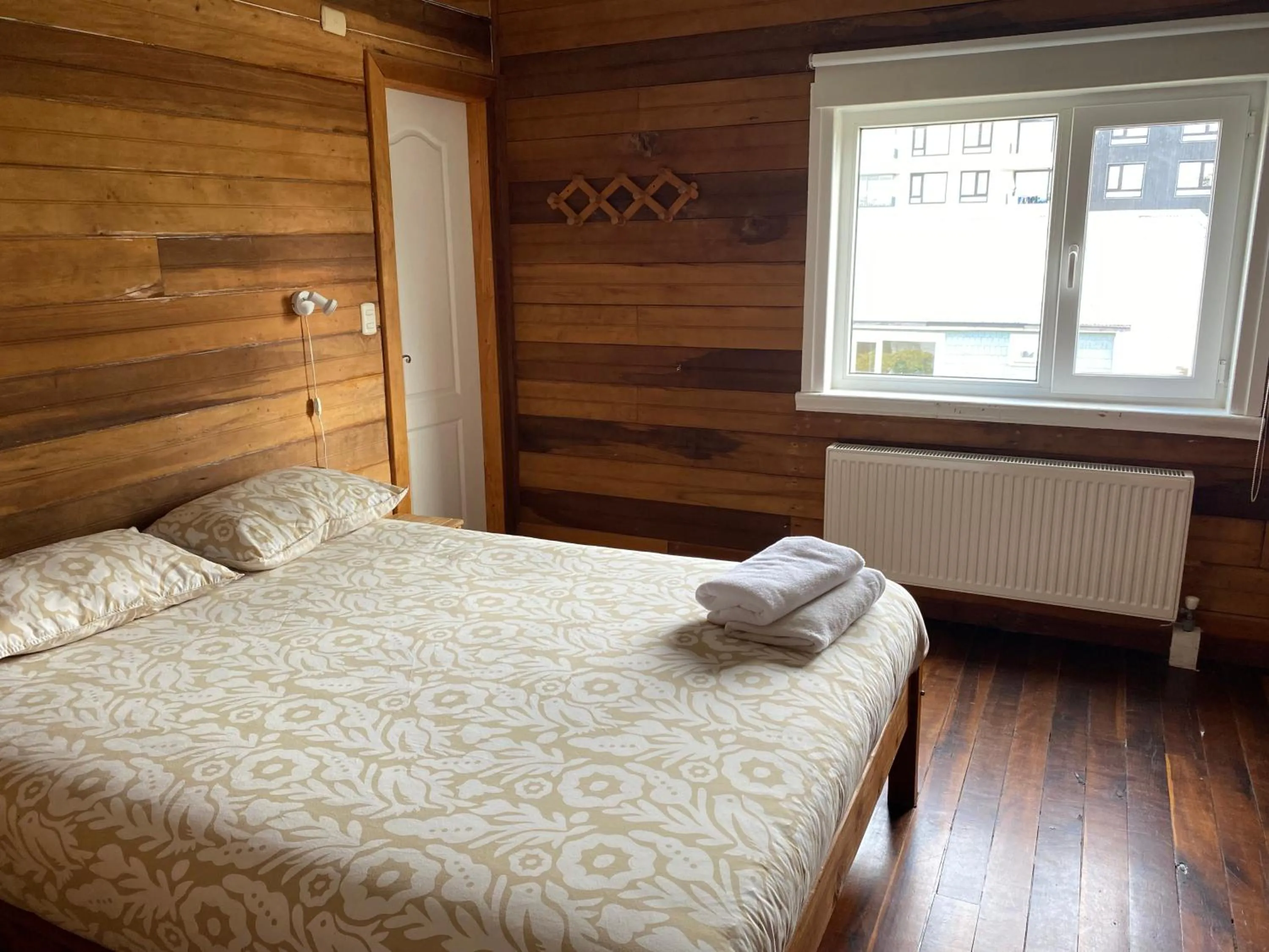Bed in Hostal Compass del Sur