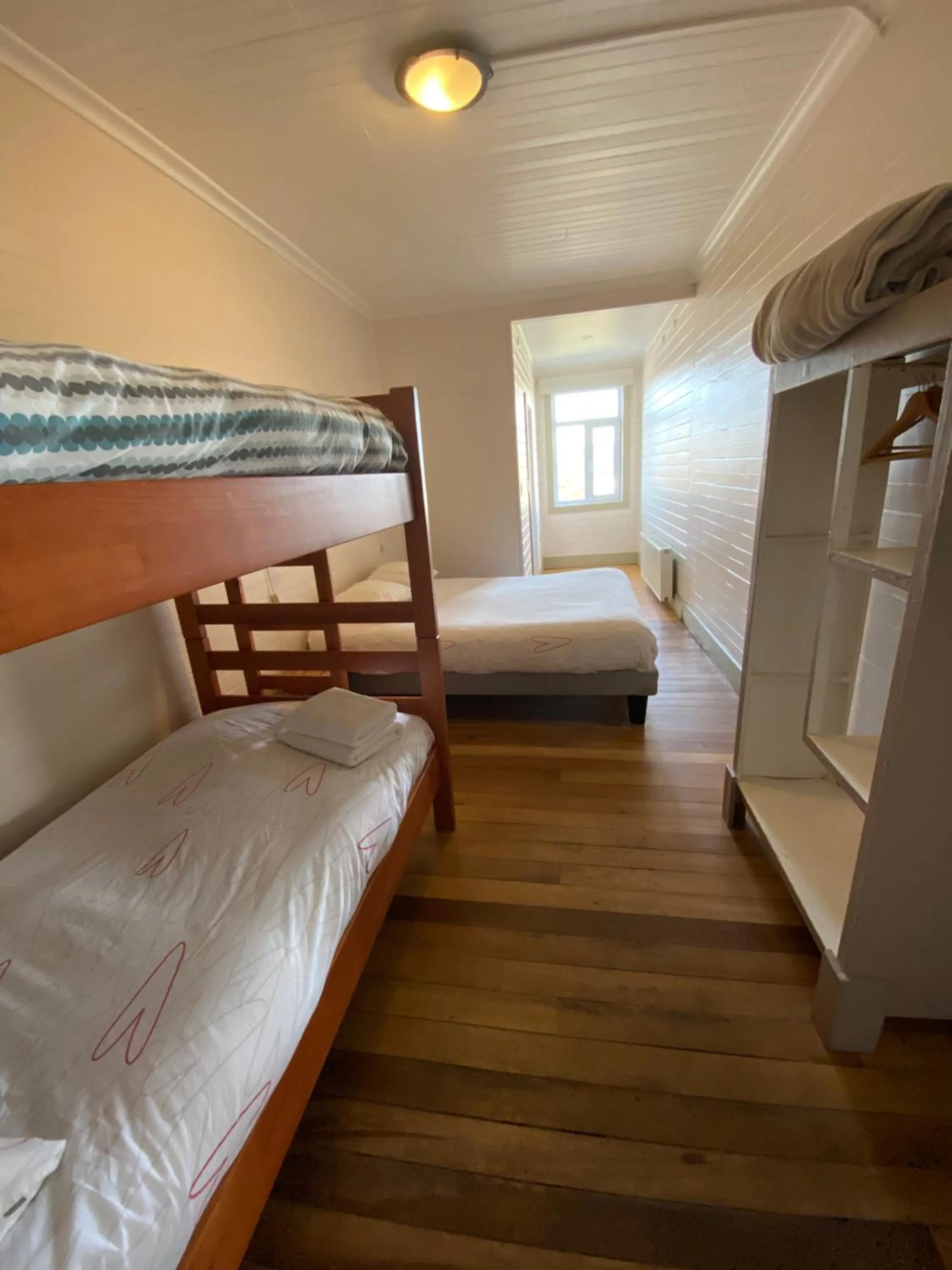 Bed in Hostal Compass del Sur