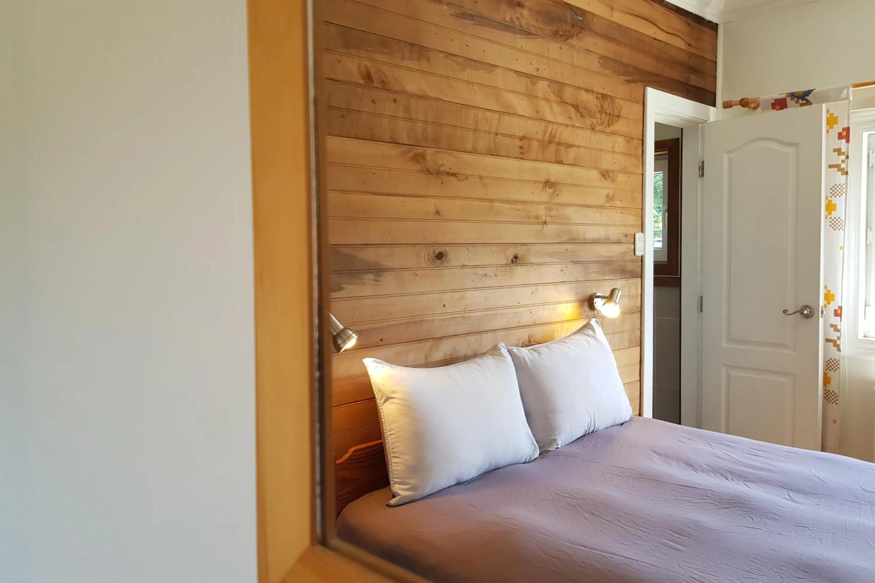 Bed in Hostal Compass del Sur
