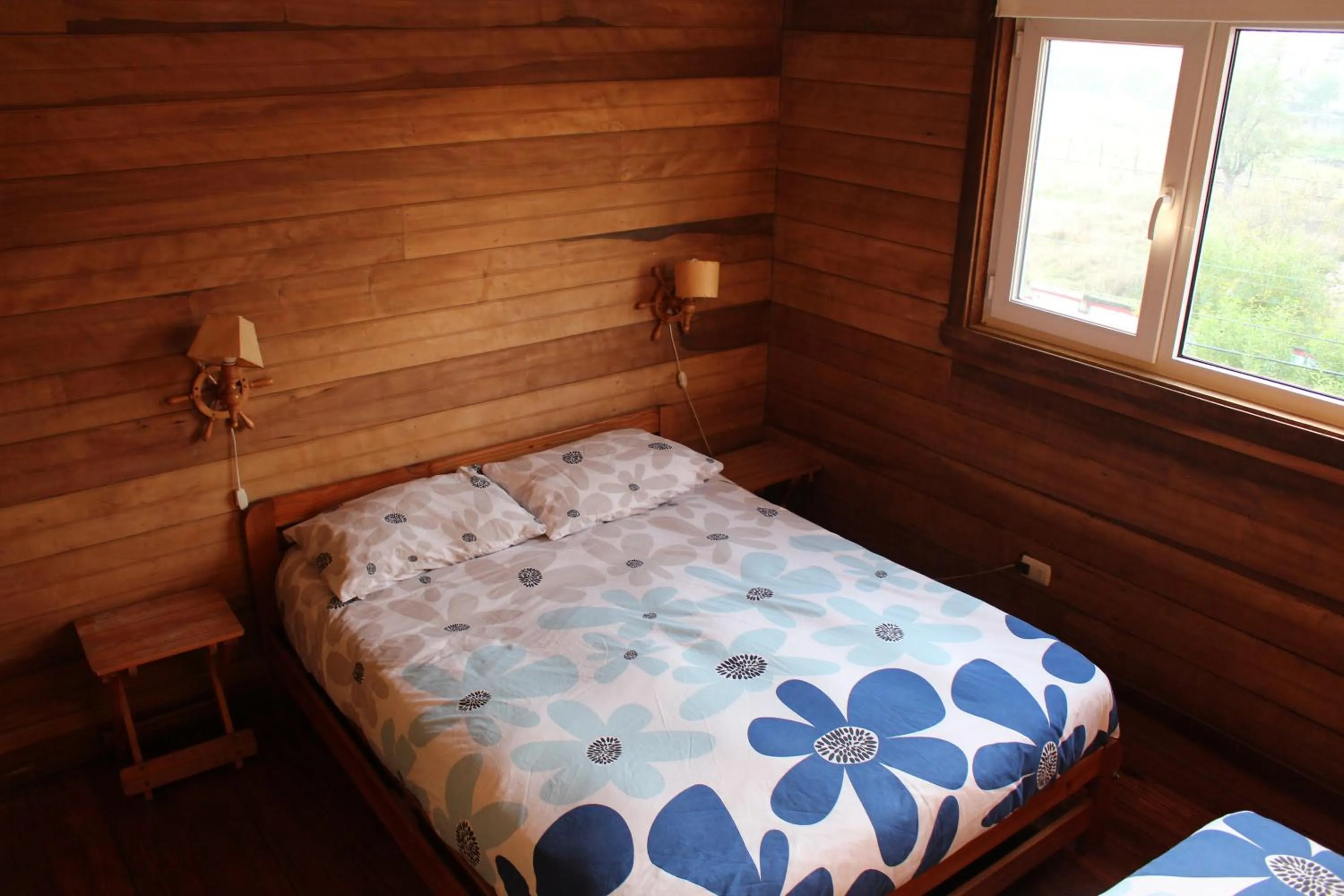 Bed in Hostal Compass del Sur