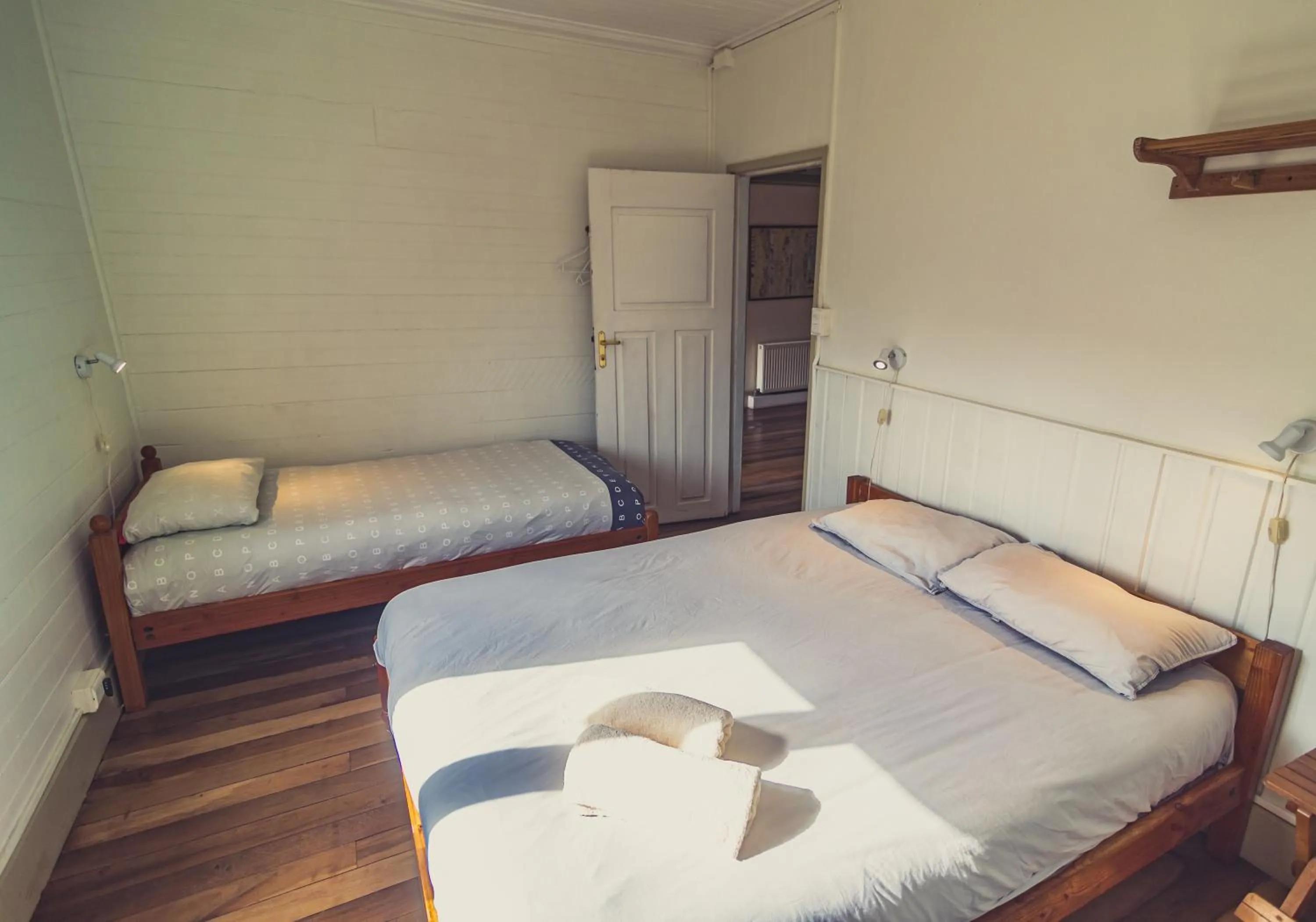 Bed in Hostal Compass del Sur