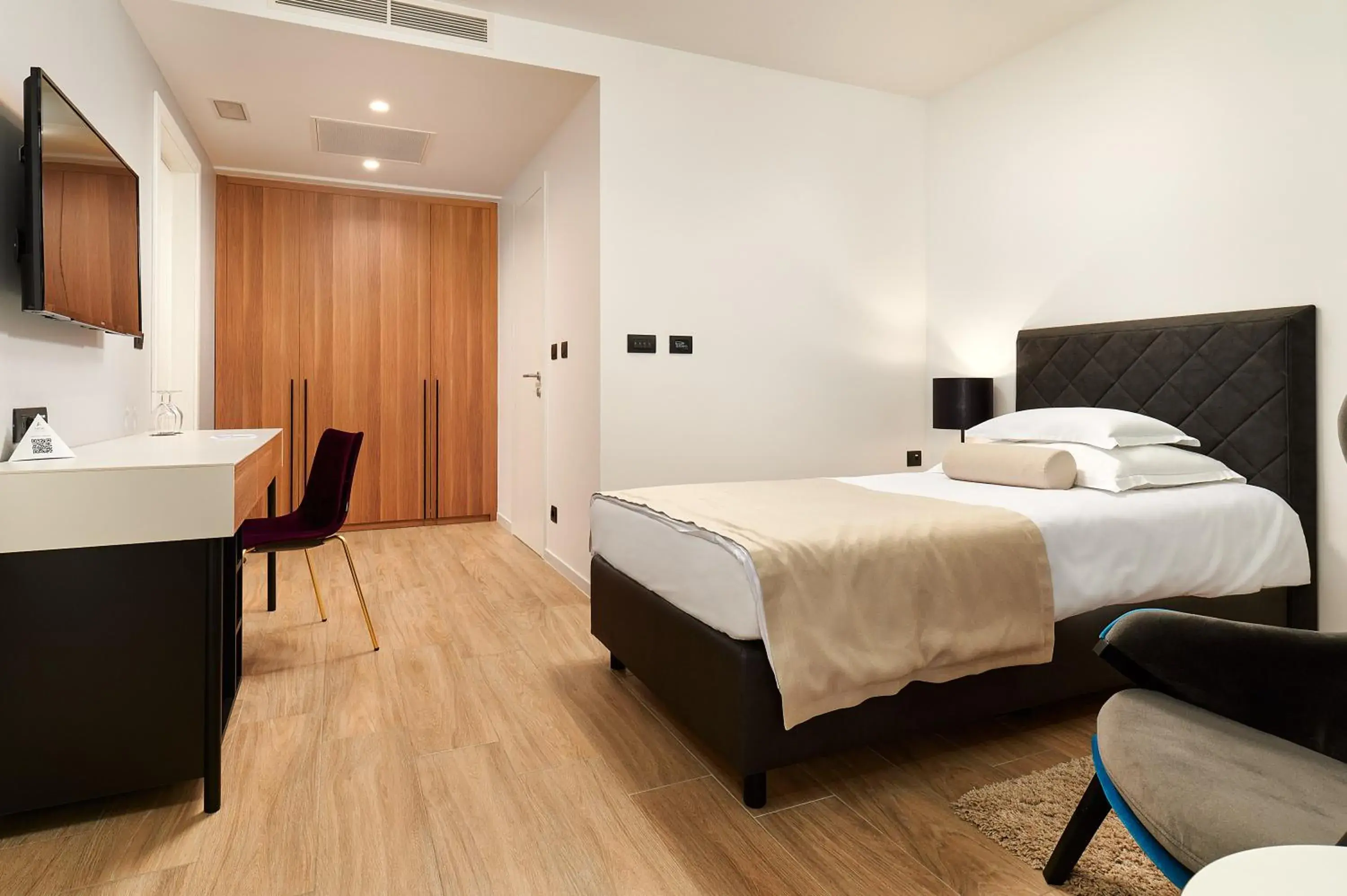 Bed in Amphora Hotel Bed in Amphora Hotel