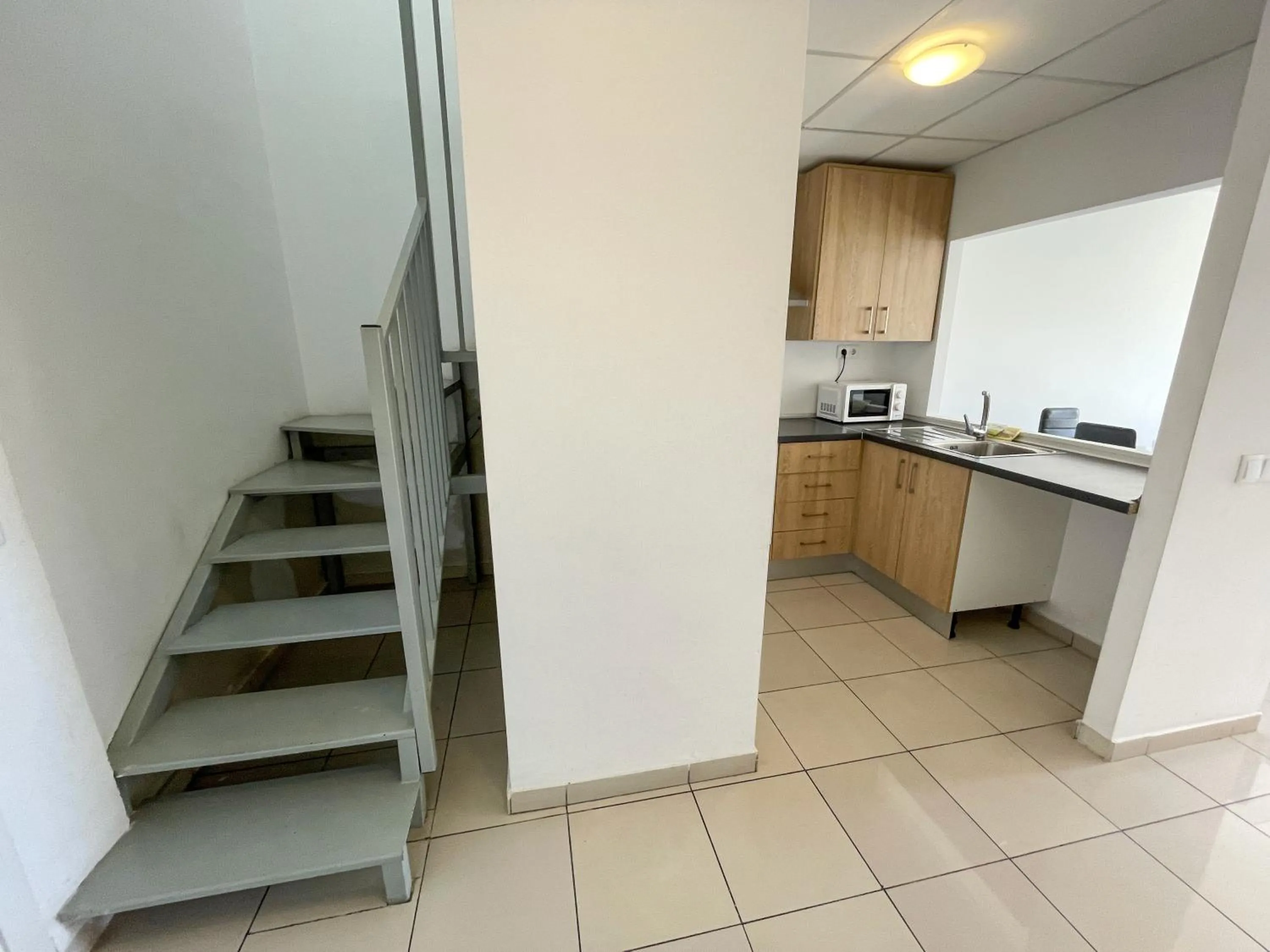 Kitchen or kitchenette in Apartamentos Playa de Benicarló 3000