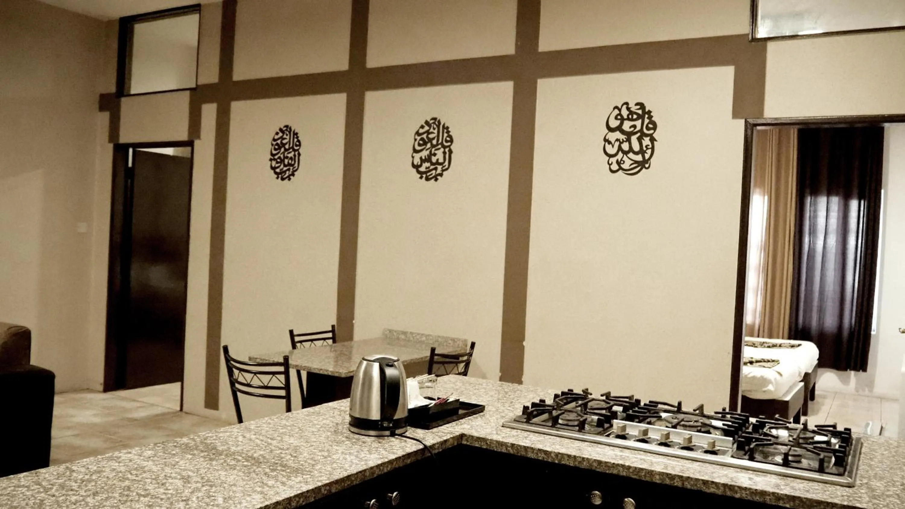 Kitchen or kitchenette in Al Fawanes Hotel Apartments